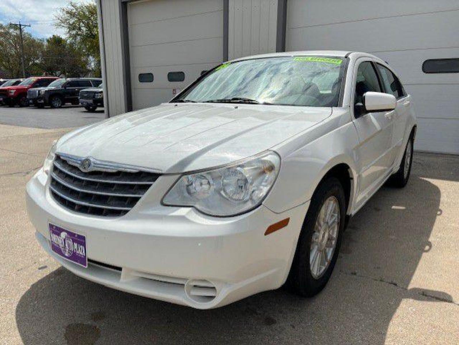 2009 WHITE CHRYSLER SEBRING TOURING (1C3LC56B19N) with an 2.4L engine, Automatic transmission, located at 1100 W. Sheridan Ave., Shenandoah, 51601, (712) 246-1600, 40.765678, -95.388817 - Photo #0
