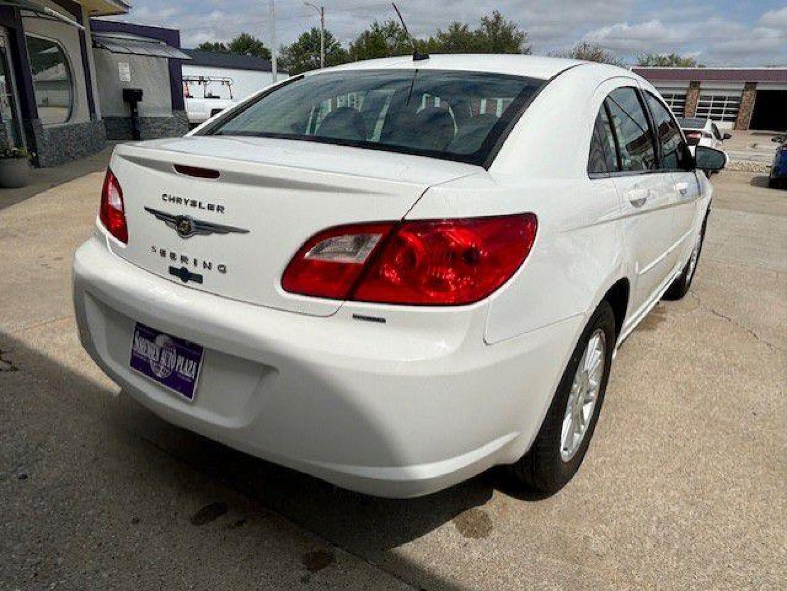 2009 WHITE CHRYSLER SEBRING TOURING (1C3LC56B19N) with an 2.4L engine, Automatic transmission, located at 1100 W. Sheridan Ave., Shenandoah, 51601, (712) 246-1600, 40.765678, -95.388817 - Photo #1