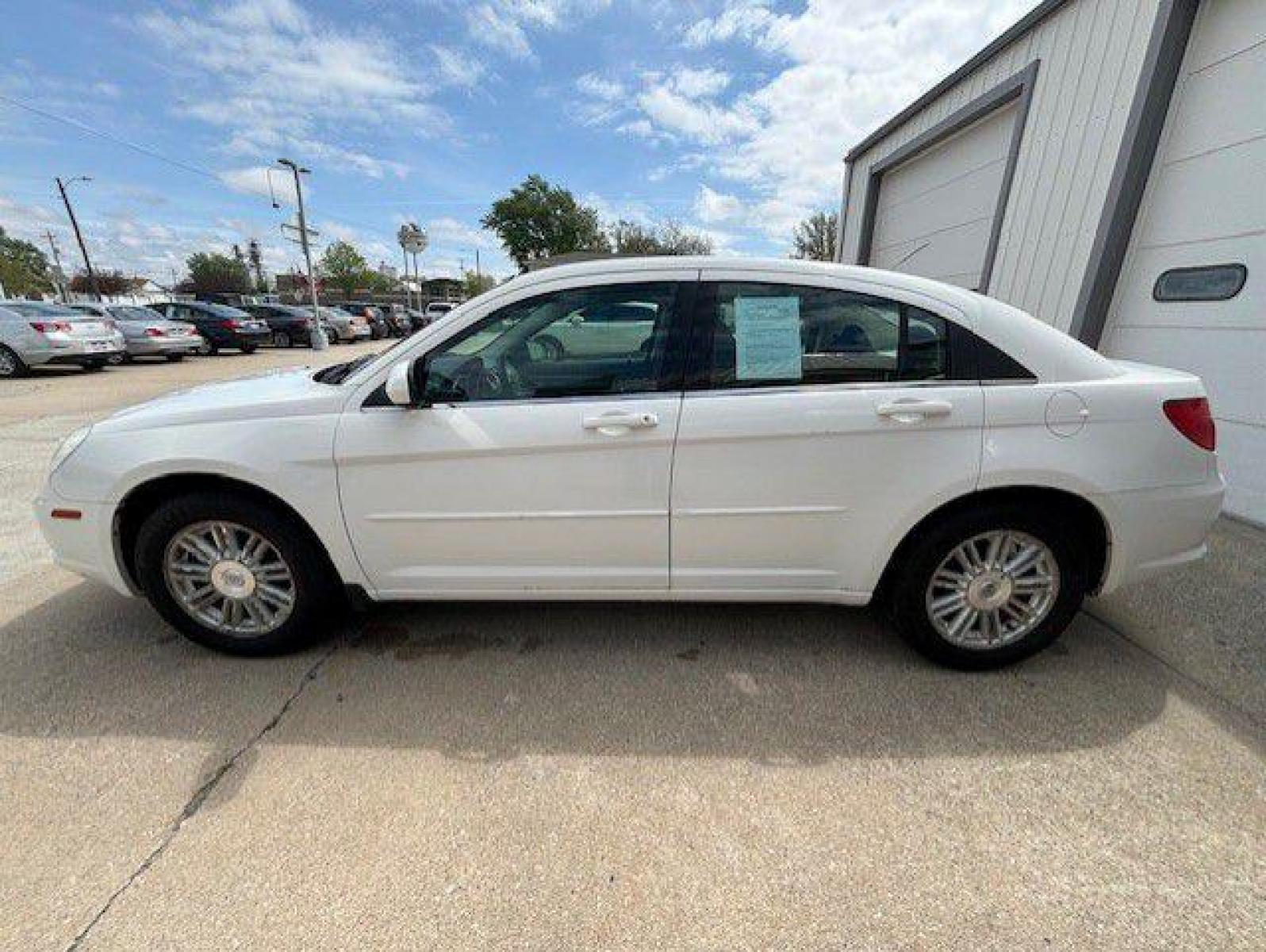 2009 WHITE CHRYSLER SEBRING TOURING (1C3LC56B19N) with an 2.4L engine, Automatic transmission, located at 1100 W. Sheridan Ave., Shenandoah, 51601, (712) 246-1600, 40.765678, -95.388817 - Photo #2