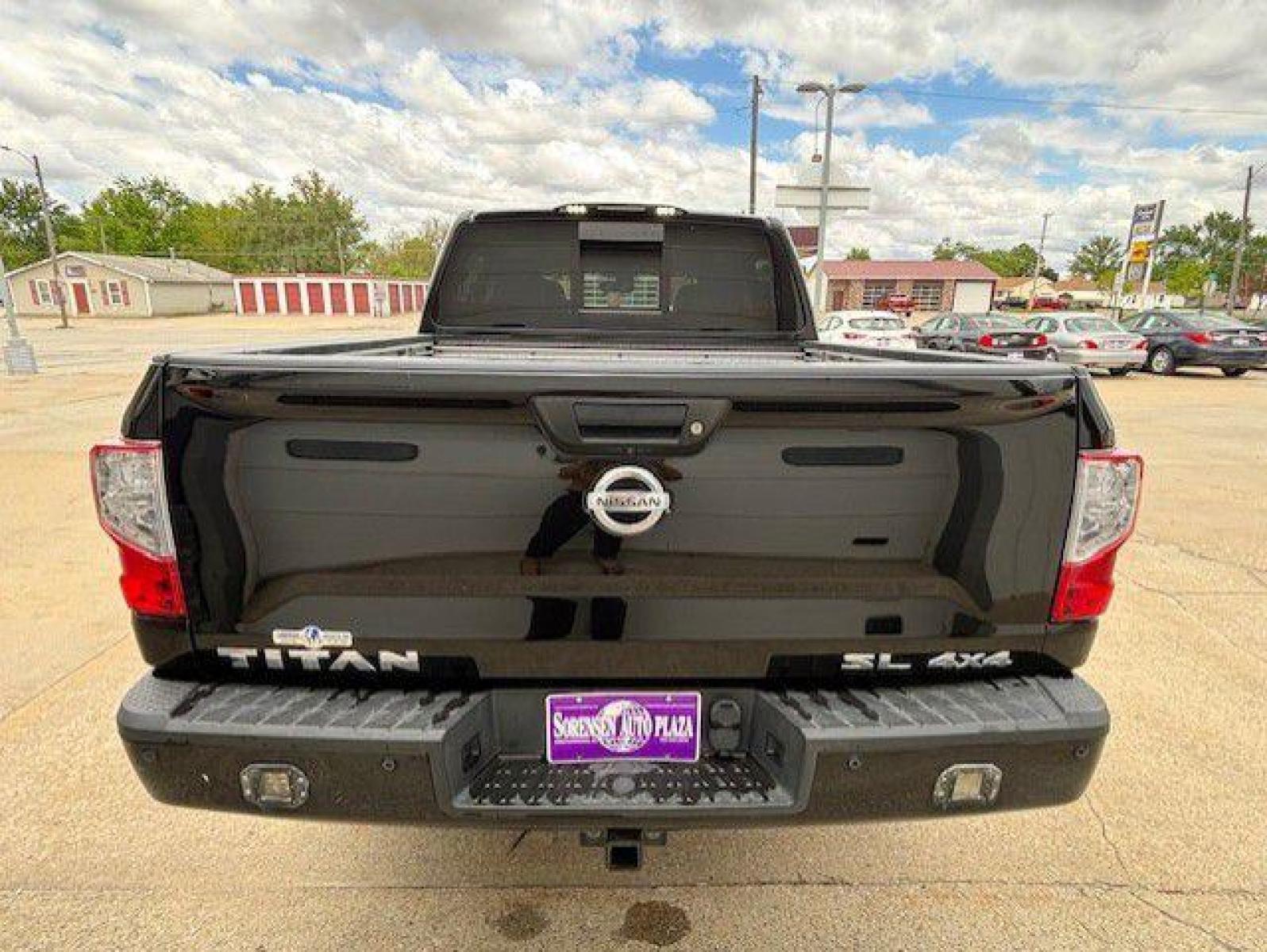 2017 BLACK NISSAN TITAN SV (1N6AA1E52HN) with an 5.6L engine, Automatic transmission, located at 1100 W. Sheridan Ave., Shenandoah, 51601, (712) 246-1600, 40.765678, -95.388817 - Photo #2