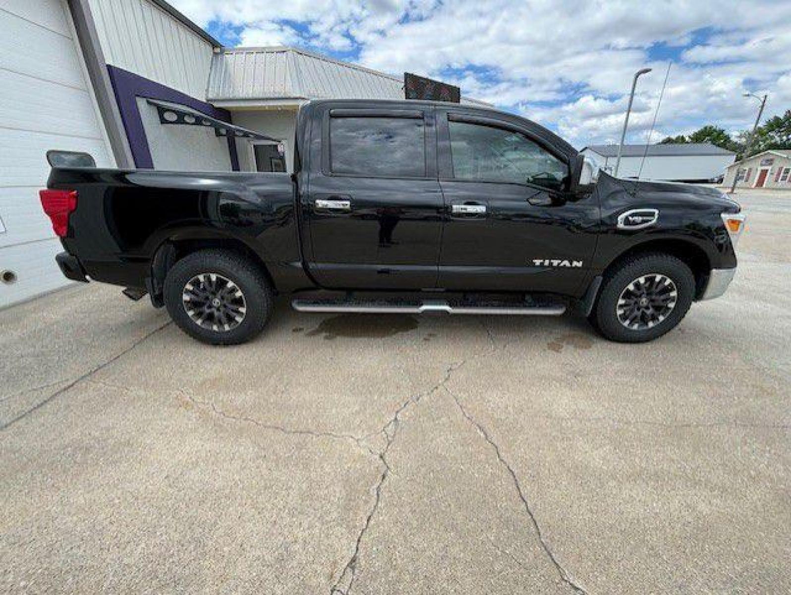 2017 BLACK NISSAN TITAN SV (1N6AA1E52HN) with an 5.6L engine, Automatic transmission, located at 1100 W. Sheridan Ave., Shenandoah, 51601, (712) 246-1600, 40.765678, -95.388817 - Photo #3