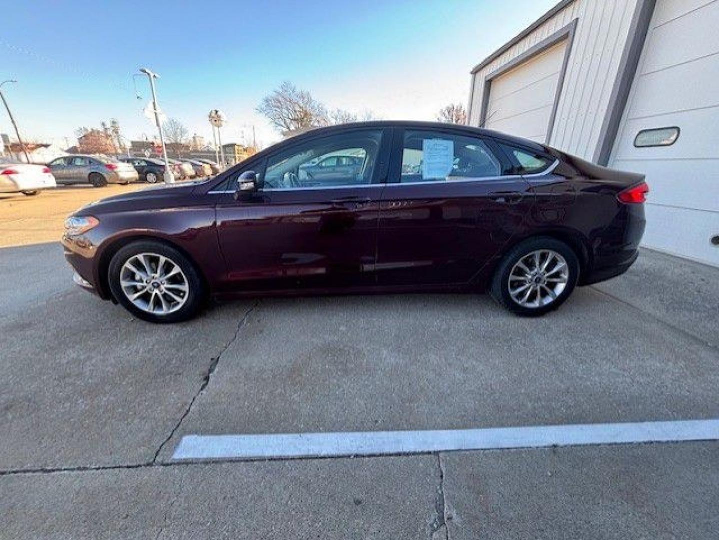 2017 MAROON FORD FUSION SE (3FA6P0H72HR) with an 2.5L engine, Automatic transmission, located at 1100 W. Sheridan Ave., Shenandoah, 51601, (712) 246-1600, 40.765678, -95.388817- Photo#1