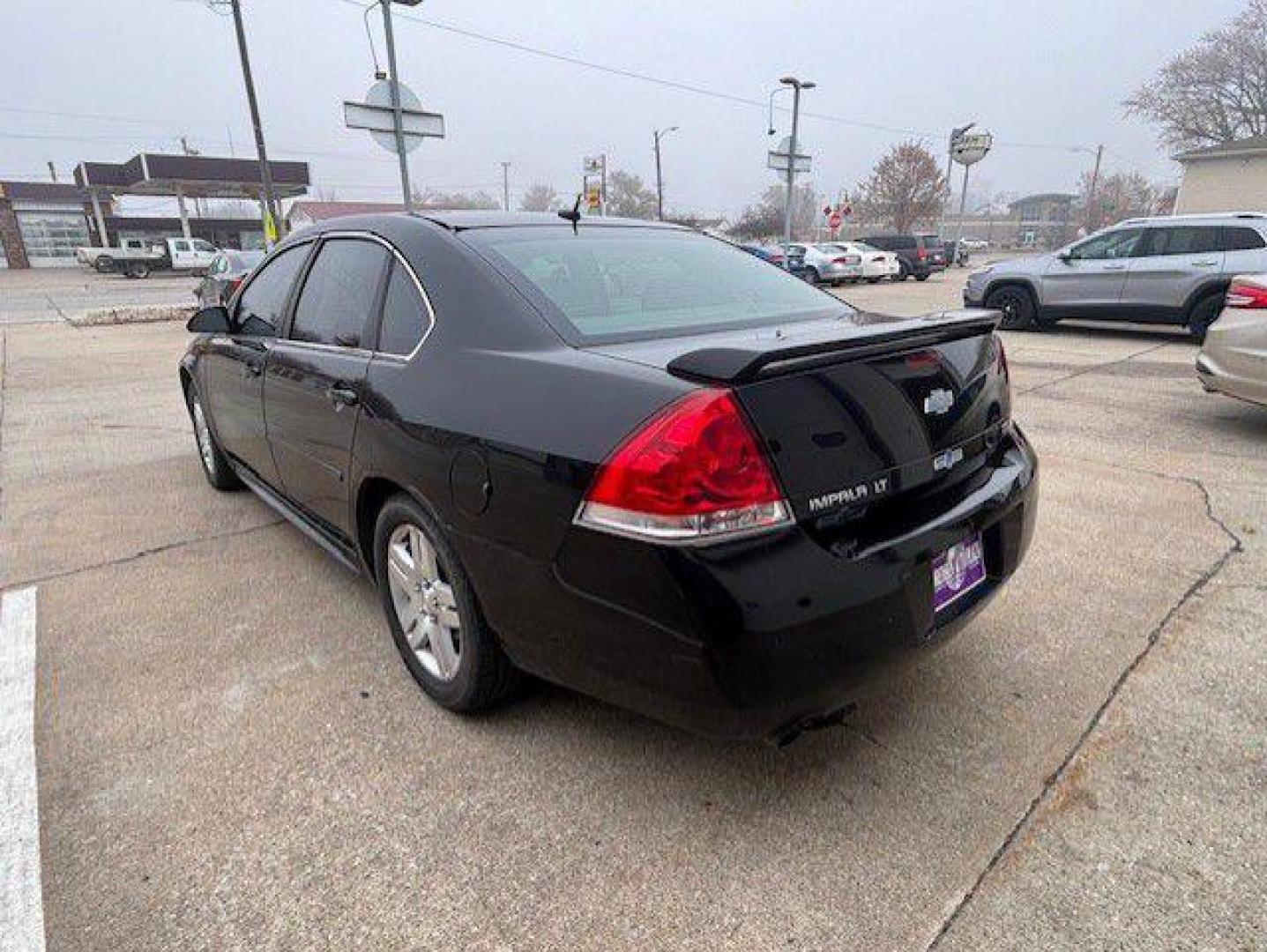 2013 BLACK CHEVROLET IMPALA LT (2G1WG5E36D1) with an 3.6L engine, Automatic transmission, located at 1100 W. Sheridan Ave., Shenandoah, 51601, (712) 246-1600, 40.765678, -95.388817 - Photo#4