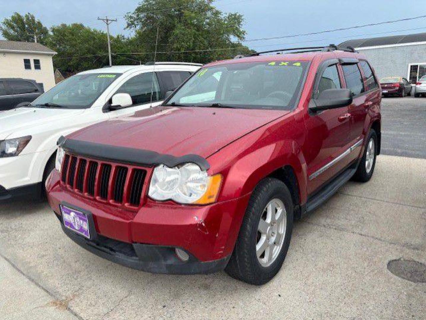 2010 RED JEEP GRAND CHEROKEE LAREDO (1J4PR4GK5AC) with an 3.7L engine, Automatic transmission, located at 1100 W. Sheridan Ave., Shenandoah, 51601, (712) 246-1600, 40.765678, -95.388817 - Photo#0