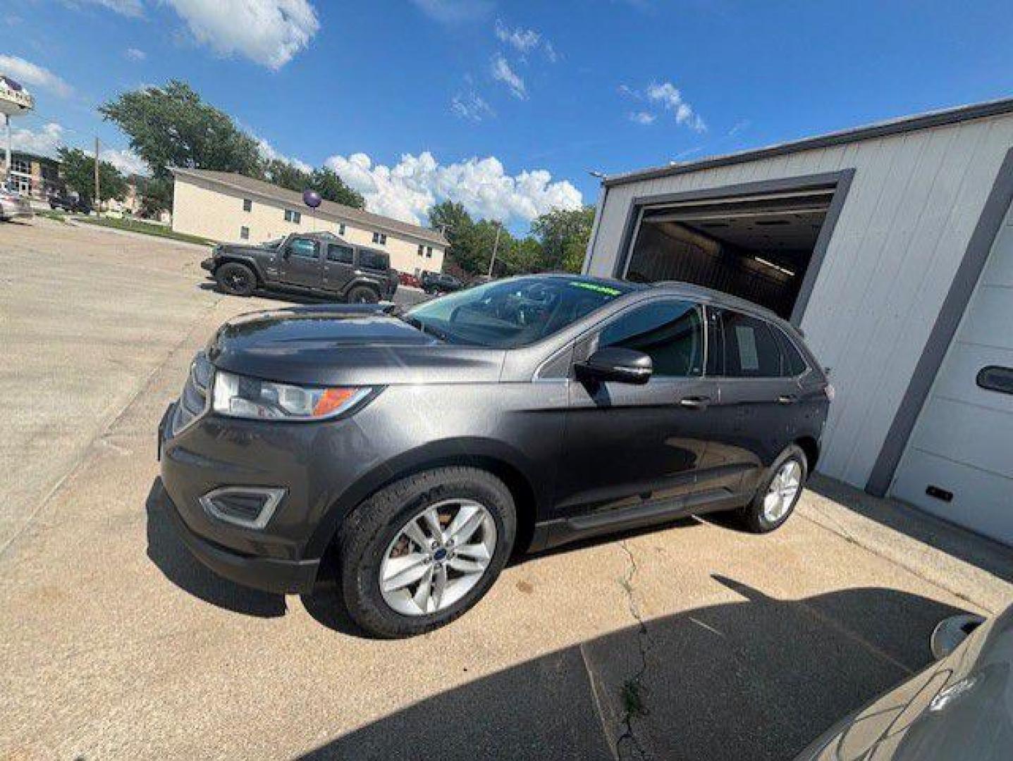 2015 GRAY FORD EDGE SEL (2FMTK4J83FB) with an 3.5L engine, Automatic transmission, located at 1100 W. Sheridan Ave., Shenandoah, 51601, (712) 246-1600, 40.765678, -95.388817 - Photo#1