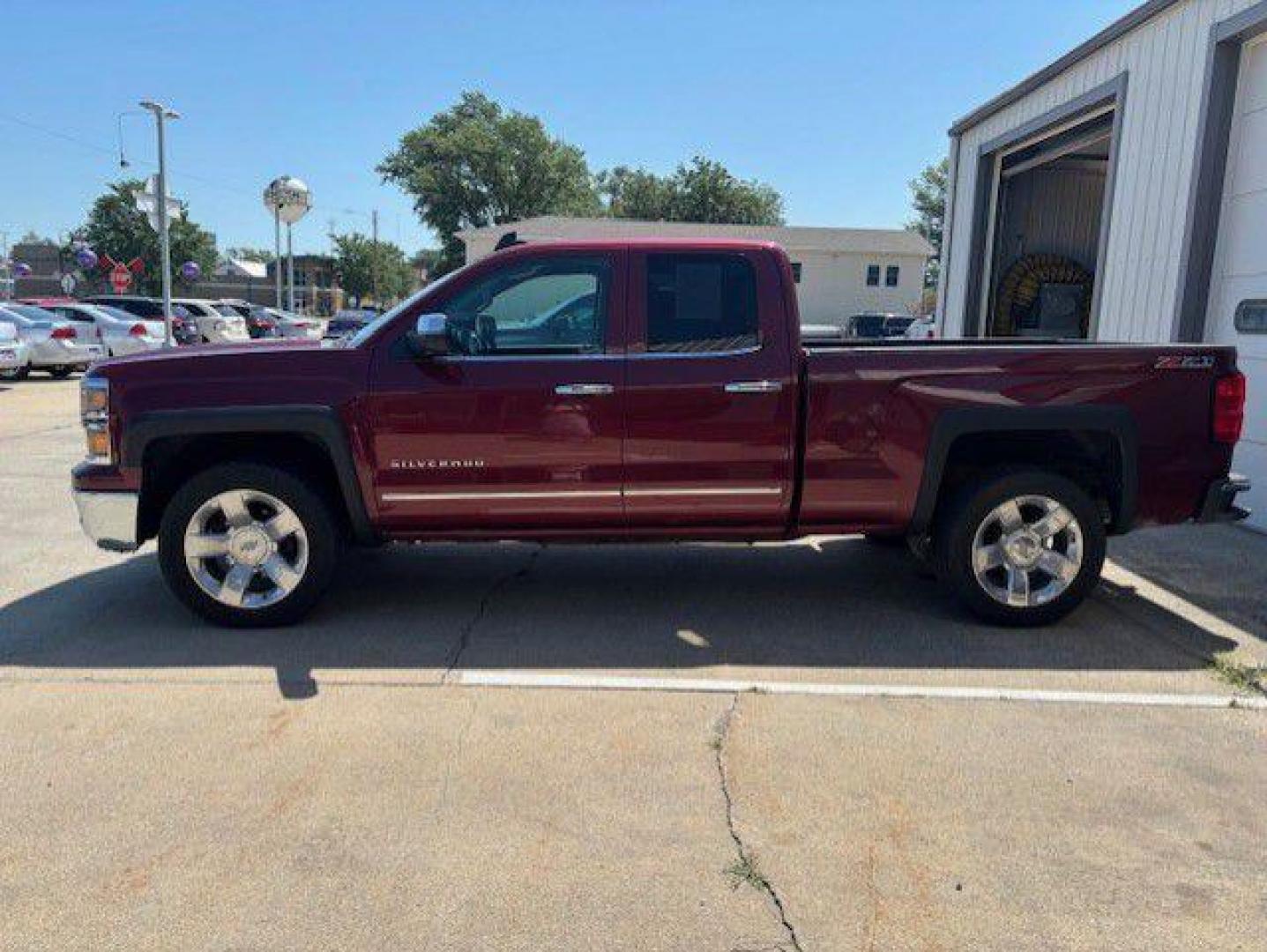 2015 RED CHEVROLET SILVERADO 1500 LTZ (1GCVKSEC9FZ) with an 5.3L engine, Automatic transmission, located at 1100 W. Sheridan Ave., Shenandoah, 51601, (712) 246-1600, 40.765678, -95.388817 - Photo#1