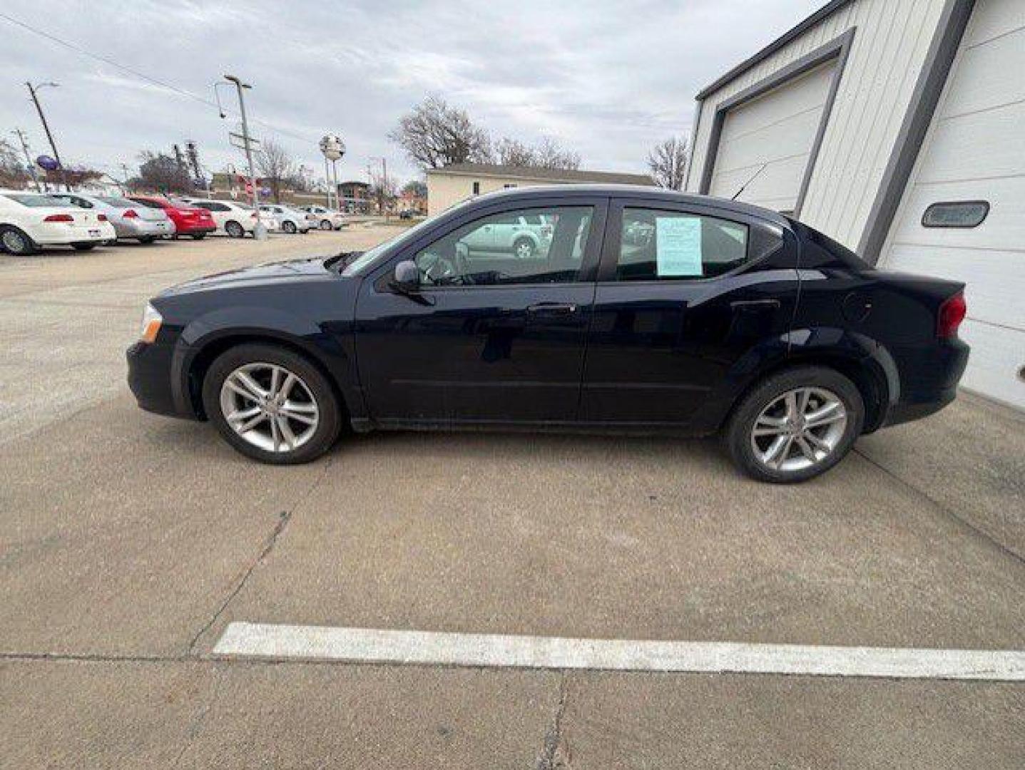 2011 BLUE DODGE AVENGER MAINSTREET (1B3BD1FG5BN) with an 3.6L engine, Automatic transmission, located at 1100 W. Sheridan Ave., Shenandoah, 51601, (712) 246-1600, 40.765678, -95.388817 - Photo#1
