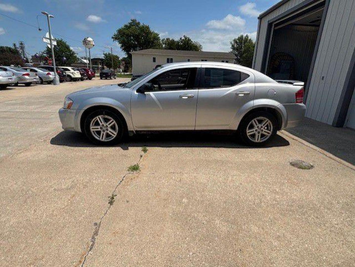 2008 SILVER DODGE AVENGER SXT (1B3LC56K08N) with an 2.4L engine, Automatic transmission, located at 1100 W. Sheridan Ave., Shenandoah, 51601, (712) 246-1600, 40.765678, -95.388817 - Photo#1