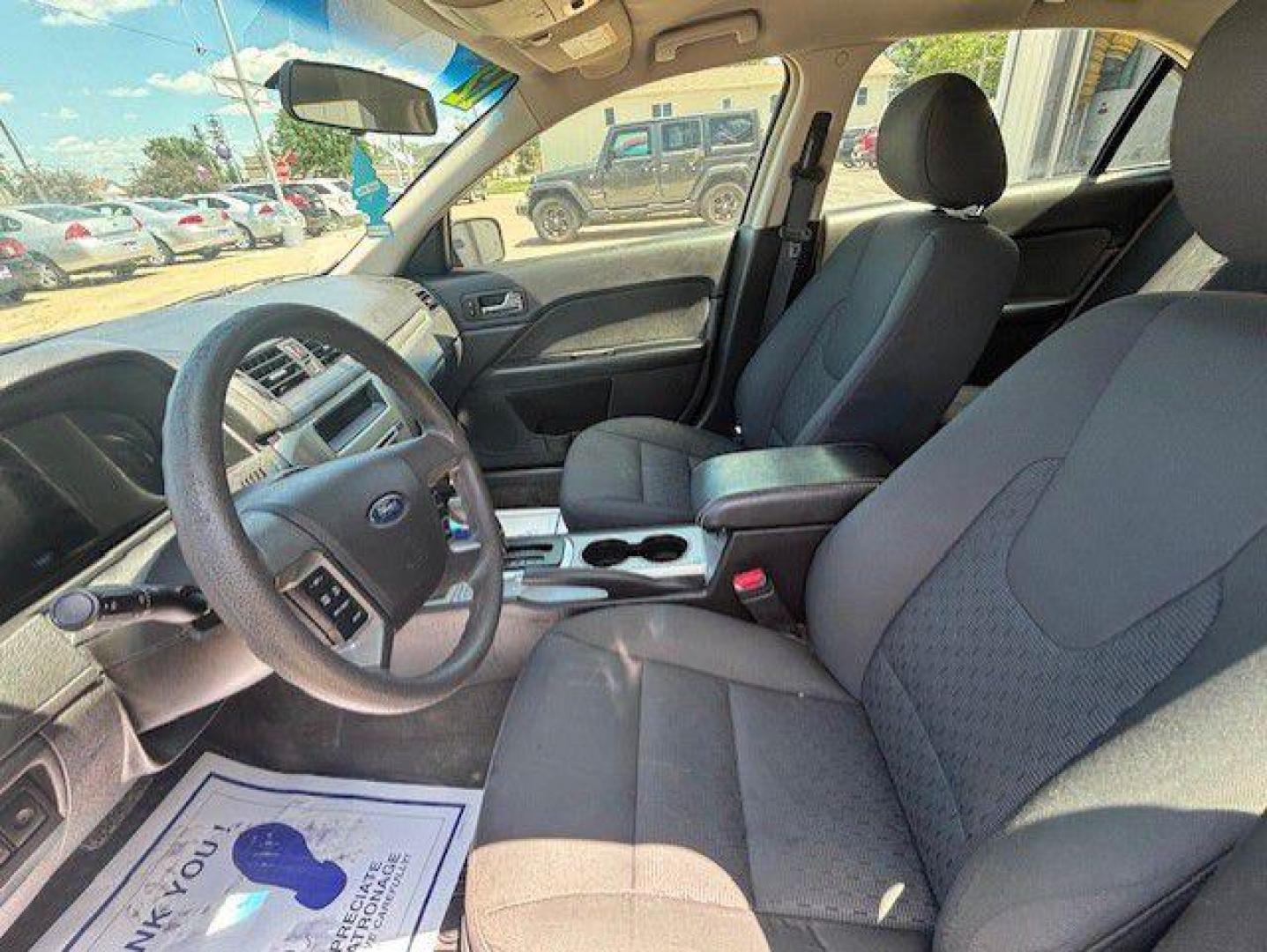 2012 BLACK FORD FUSION SE (3FAHP0HA6CR) with an 2.5L engine, Automatic transmission, located at 1100 W. Sheridan Ave., Shenandoah, 51601, (712) 246-1600, 40.765678, -95.388817 - Photo#2