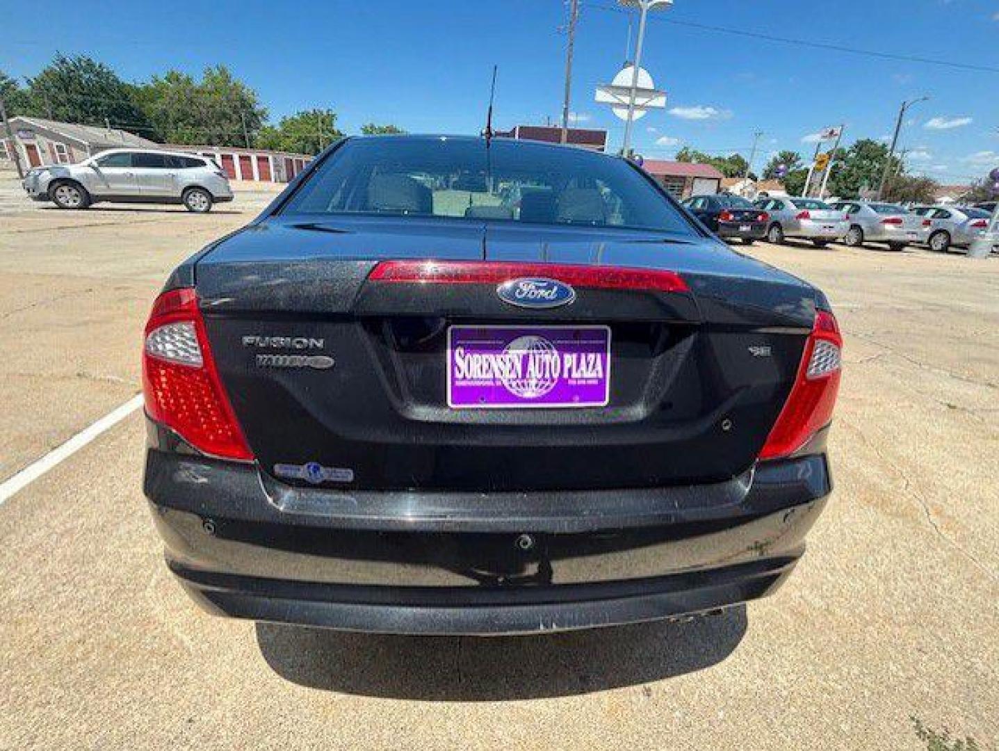 2012 BLACK FORD FUSION SE (3FAHP0HA6CR) with an 2.5L engine, Automatic transmission, located at 1100 W. Sheridan Ave., Shenandoah, 51601, (712) 246-1600, 40.765678, -95.388817 - Photo#5