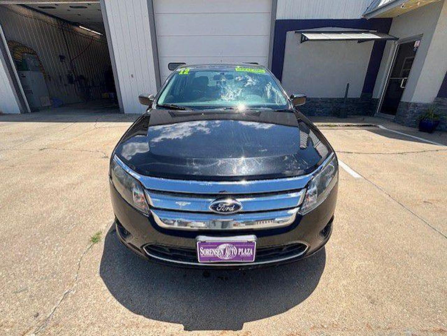 2012 BLACK FORD FUSION SE (3FAHP0HA6CR) with an 2.5L engine, Automatic transmission, located at 1100 W. Sheridan Ave., Shenandoah, 51601, (712) 246-1600, 40.765678, -95.388817 - Photo#7