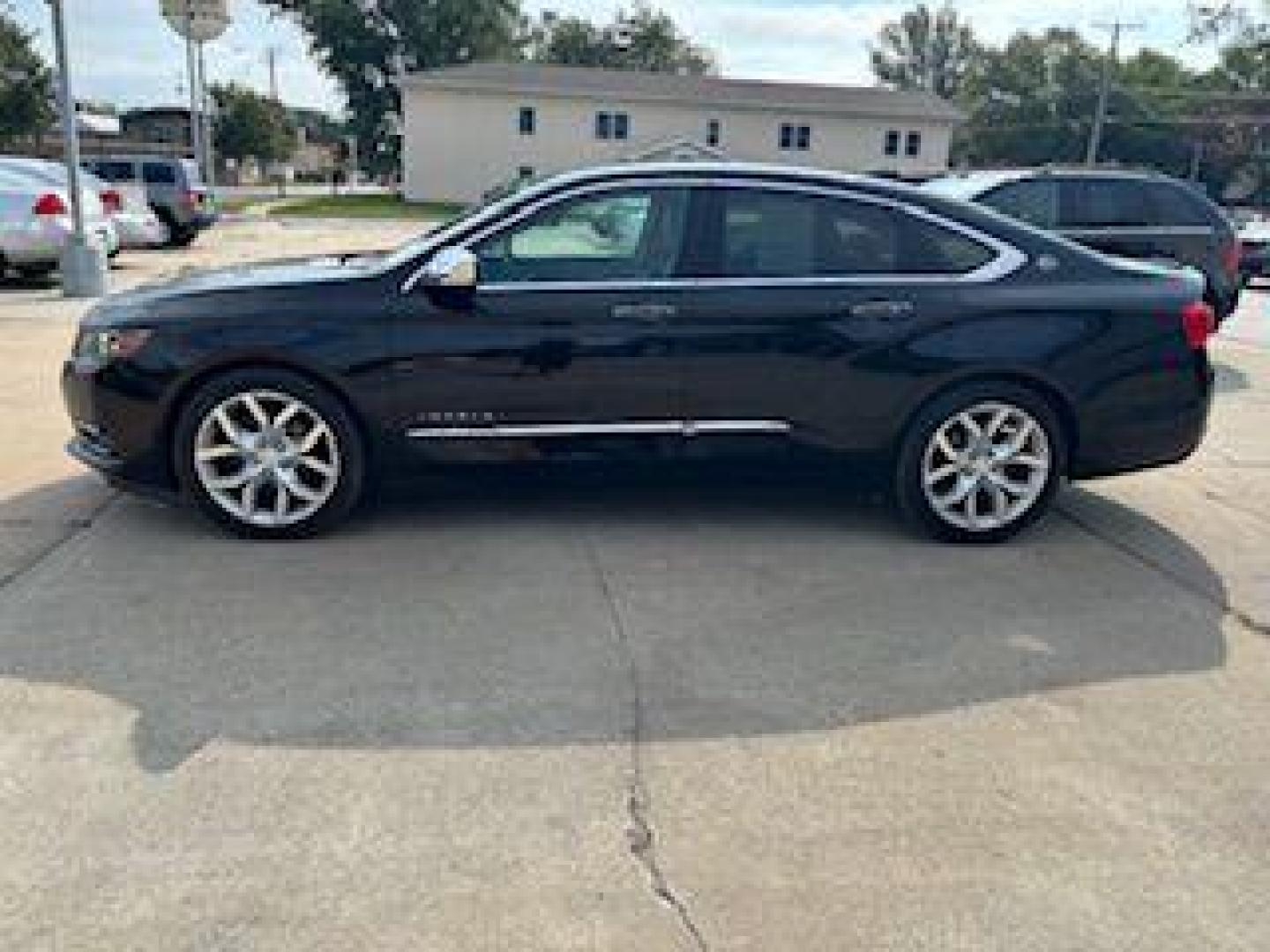 2016 BLACK CHEVROLET IMPALA LTZ (1G1145S38GU) with an 3.6L engine, Automatic transmission, located at 1100 W. Sheridan Ave., Shenandoah, 51601, (712) 246-1600, 40.765678, -95.388817 - Photo#1