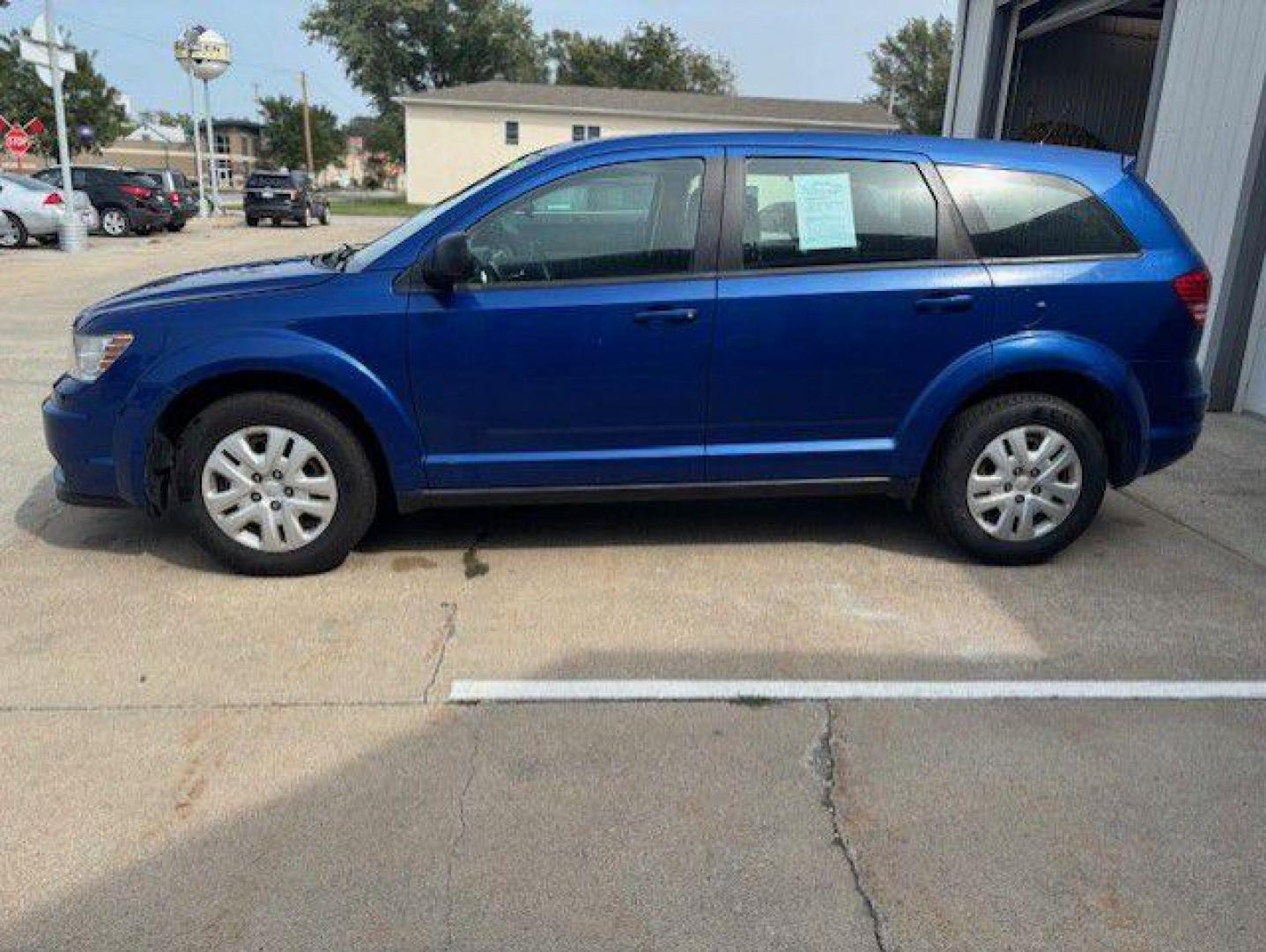 2015 BLUE DODGE JOURNEY SE (3C4PDCAB5FT) with an 2.4L engine, Automatic transmission, located at 1100 W. Sheridan Ave., Shenandoah, 51601, (712) 246-1600, 40.765678, -95.388817 - Photo#1