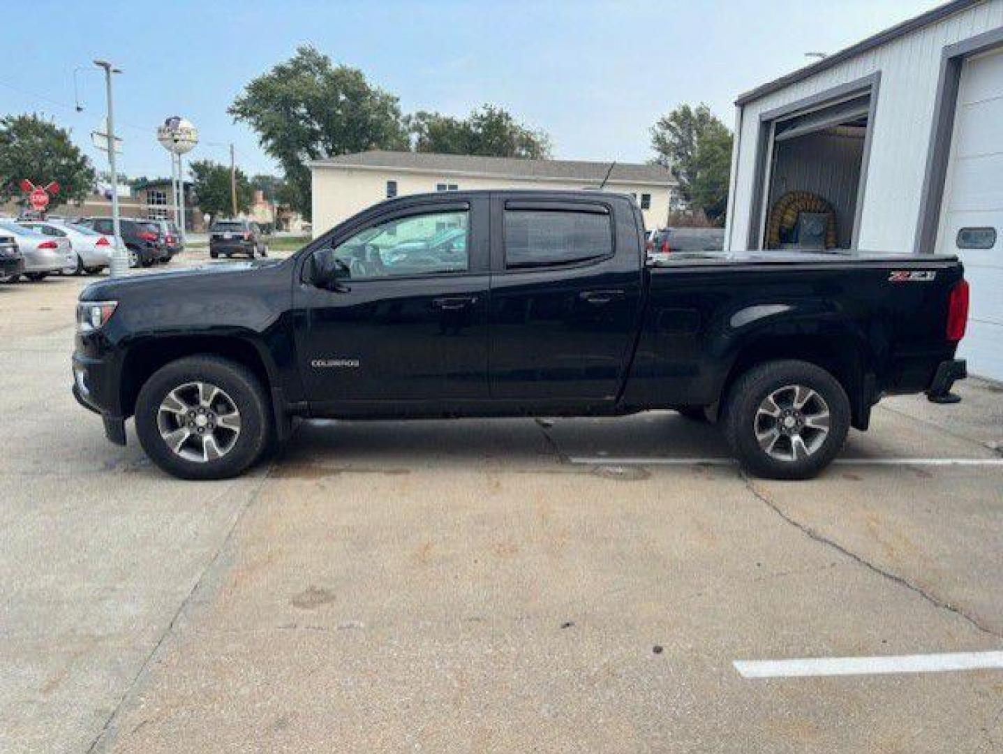 2016 BLACK CHEVROLET COLORADO Z71 (1GCGTDE37G1) with an 3.6L engine, Automatic transmission, located at 1100 W. Sheridan Ave., Shenandoah, 51601, (712) 246-1600, 40.765678, -95.388817 - Photo#1