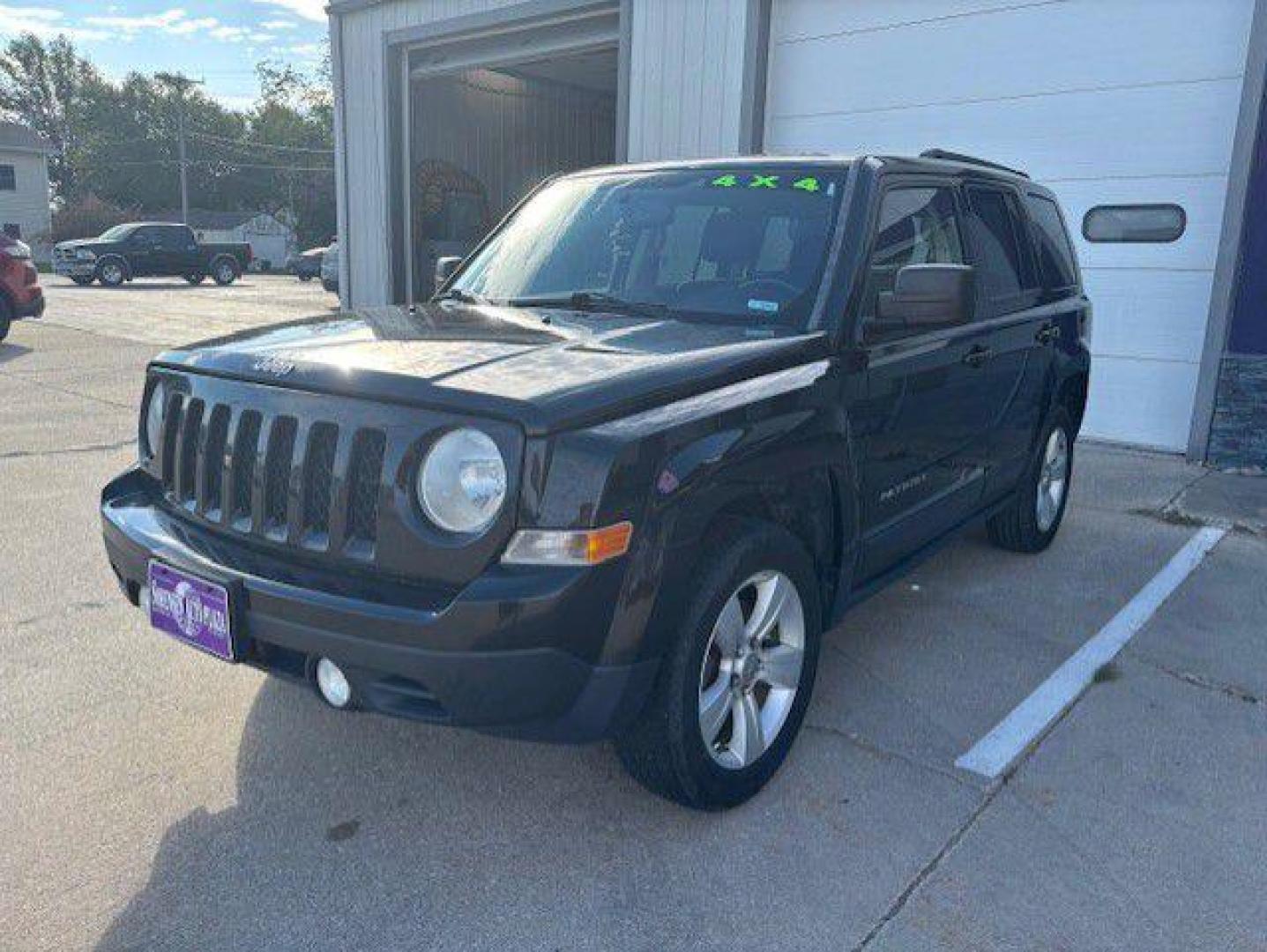 2013 BLACK JEEP PATRIOT LATITUDE (1C4NJRFB8DD) with an 2.4L engine, Continuously Variable transmission, located at 1100 W. Sheridan Ave., Shenandoah, 51601, (712) 246-1600, 40.765678, -95.388817 - Photo#0