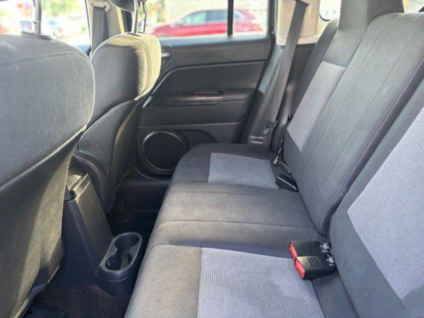 2013 BLACK JEEP PATRIOT LATITUDE (1C4NJRFB8DD) with an 2.4L engine, Continuously Variable transmission, located at 1100 W. Sheridan Ave., Shenandoah, 51601, (712) 246-1600, 40.765678, -95.388817 - Photo#4