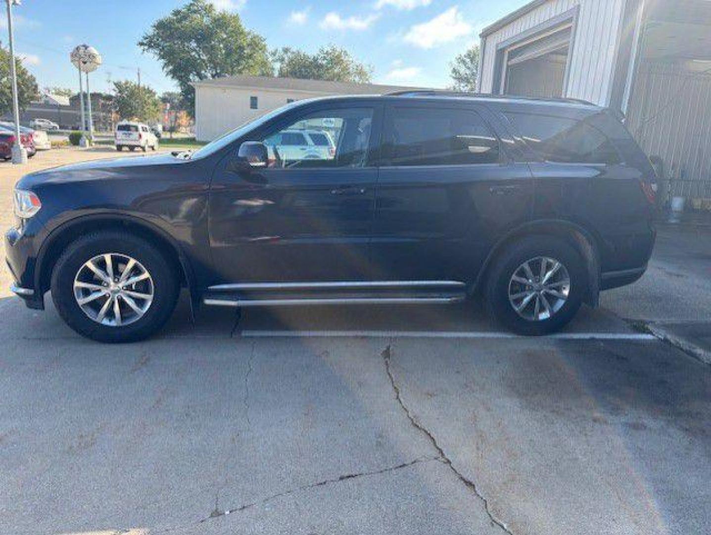 2014 BLUE DODGE DURANGO LIMITED (1C4RDJDG3EC) with an 3.6L engine, Automatic transmission, located at 1100 W. Sheridan Ave., Shenandoah, 51601, (712) 246-1600, 40.765678, -95.388817 - Photo#1