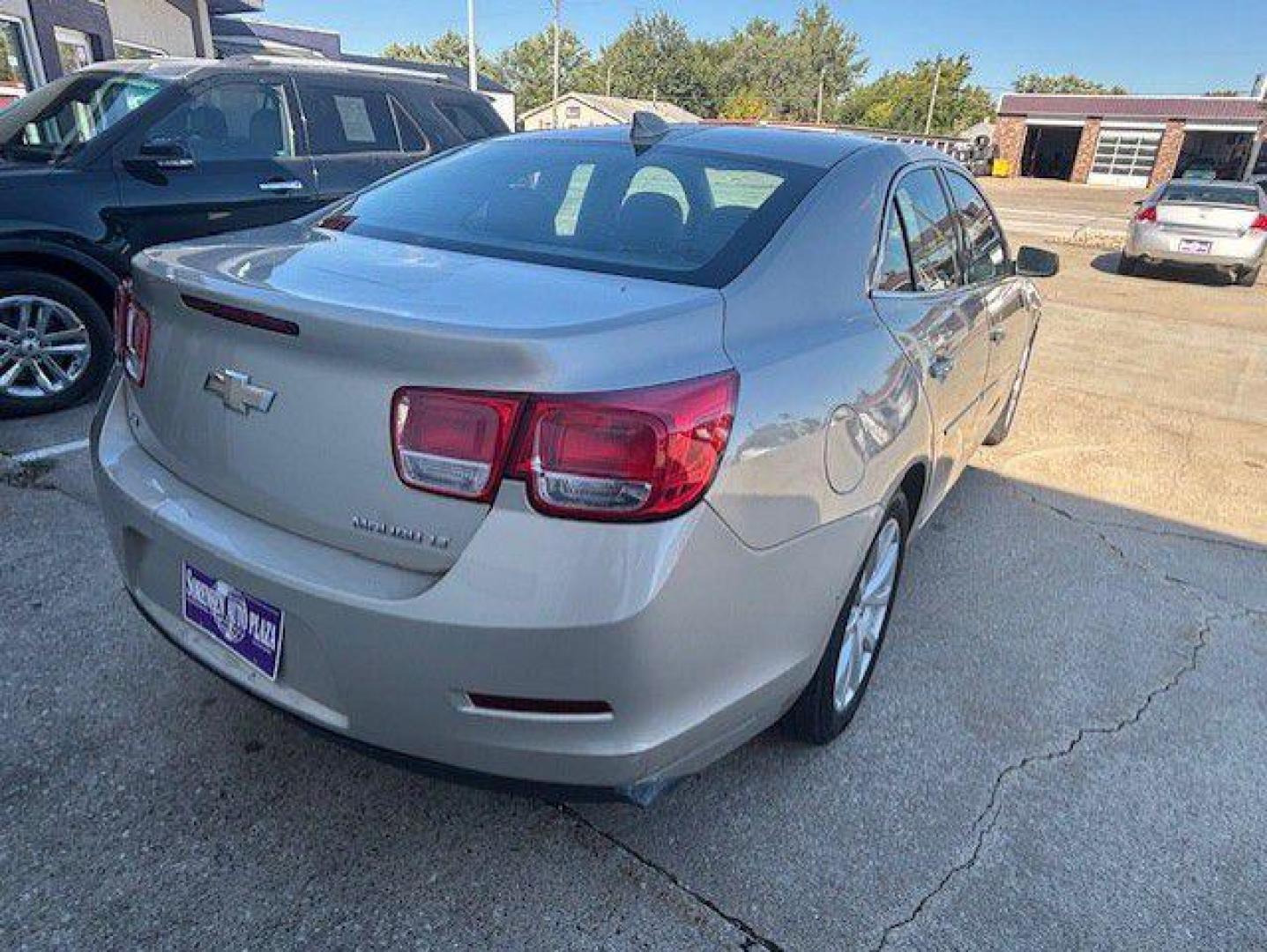 2015 BEIGE CHEVROLET MALIBU 2LT (1G11D5SL2FF) with an 2.5L engine, Automatic transmission, located at 1100 W. Sheridan Ave., Shenandoah, 51601, (712) 246-1600, 40.765678, -95.388817 - Photo#5