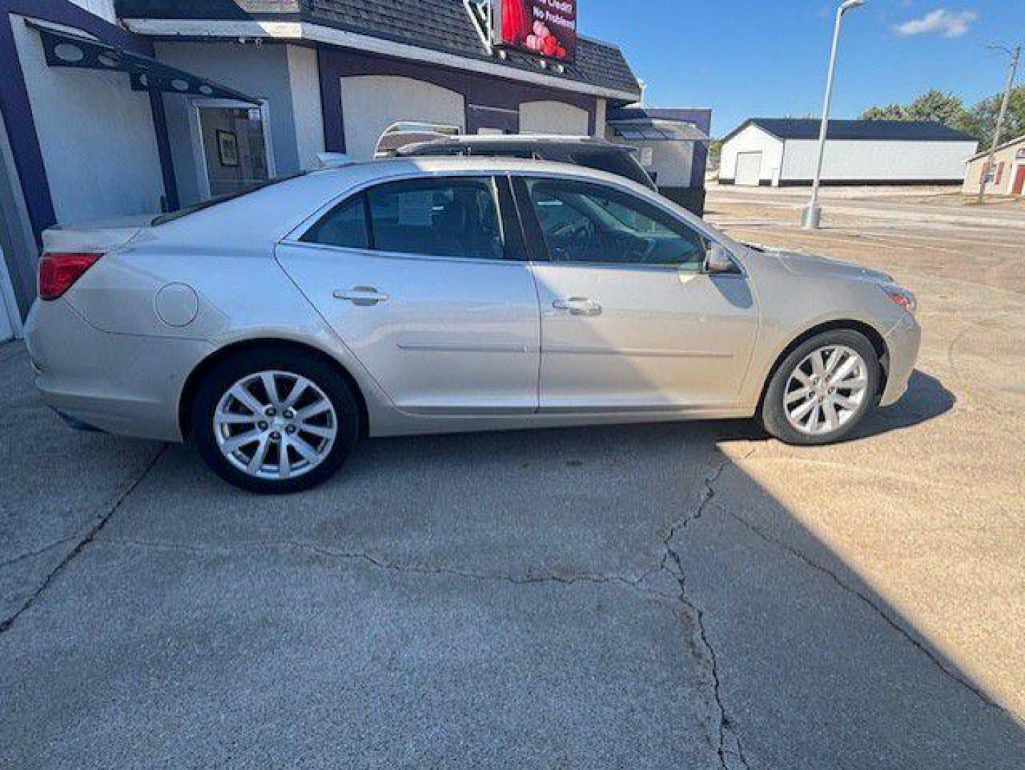 2015 BEIGE CHEVROLET MALIBU 2LT (1G11D5SL2FF) with an 2.5L engine, Automatic transmission, located at 1100 W. Sheridan Ave., Shenandoah, 51601, (712) 246-1600, 40.765678, -95.388817 - Photo#6