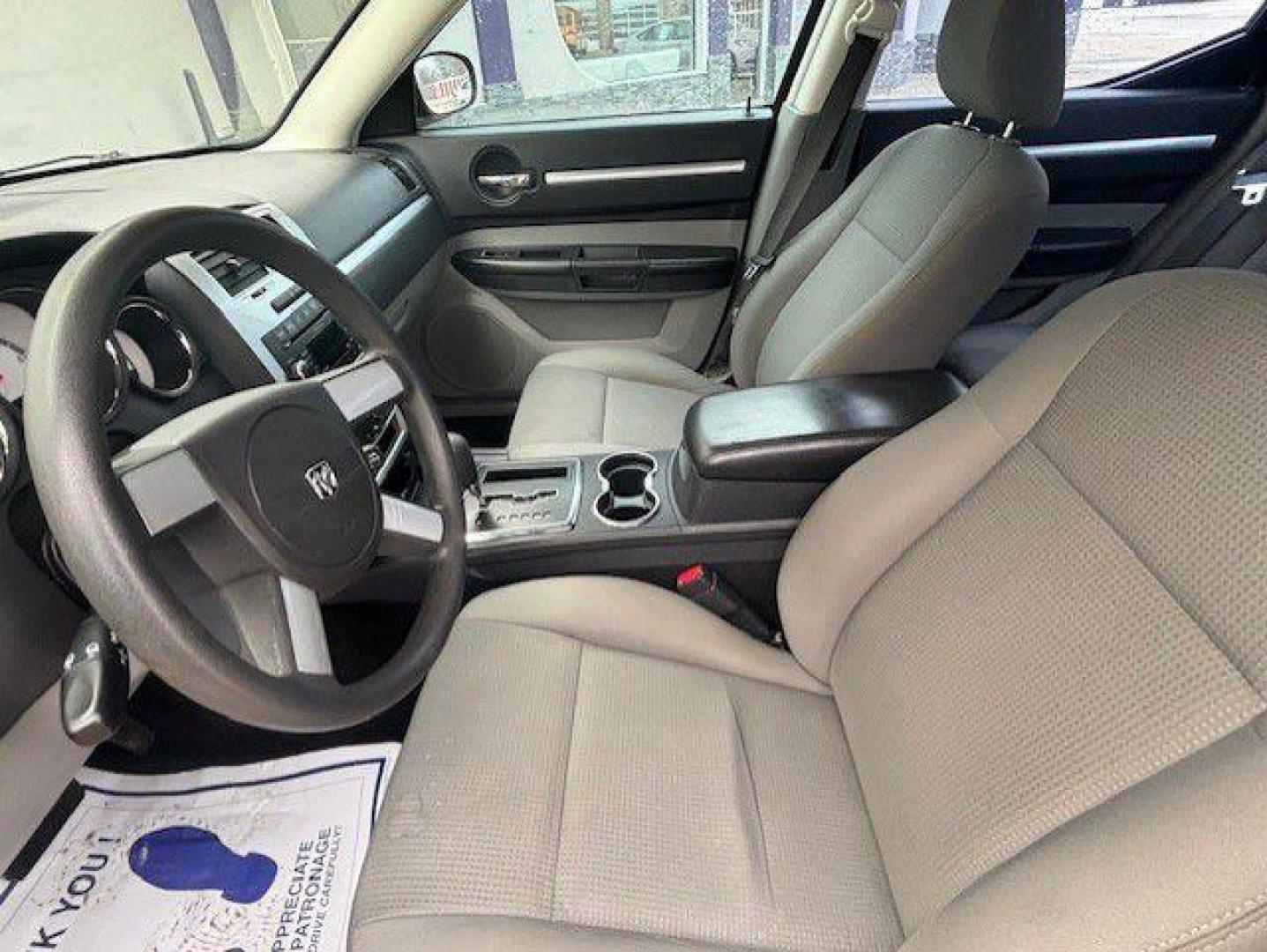 2009 BLACK DODGE CHARGER SXT (2B3KA33VX9H) with an 3.5L engine, Automatic transmission, located at 1100 W. Sheridan Ave., Shenandoah, 51601, (712) 246-1600, 40.765678, -95.388817 - Photo#2