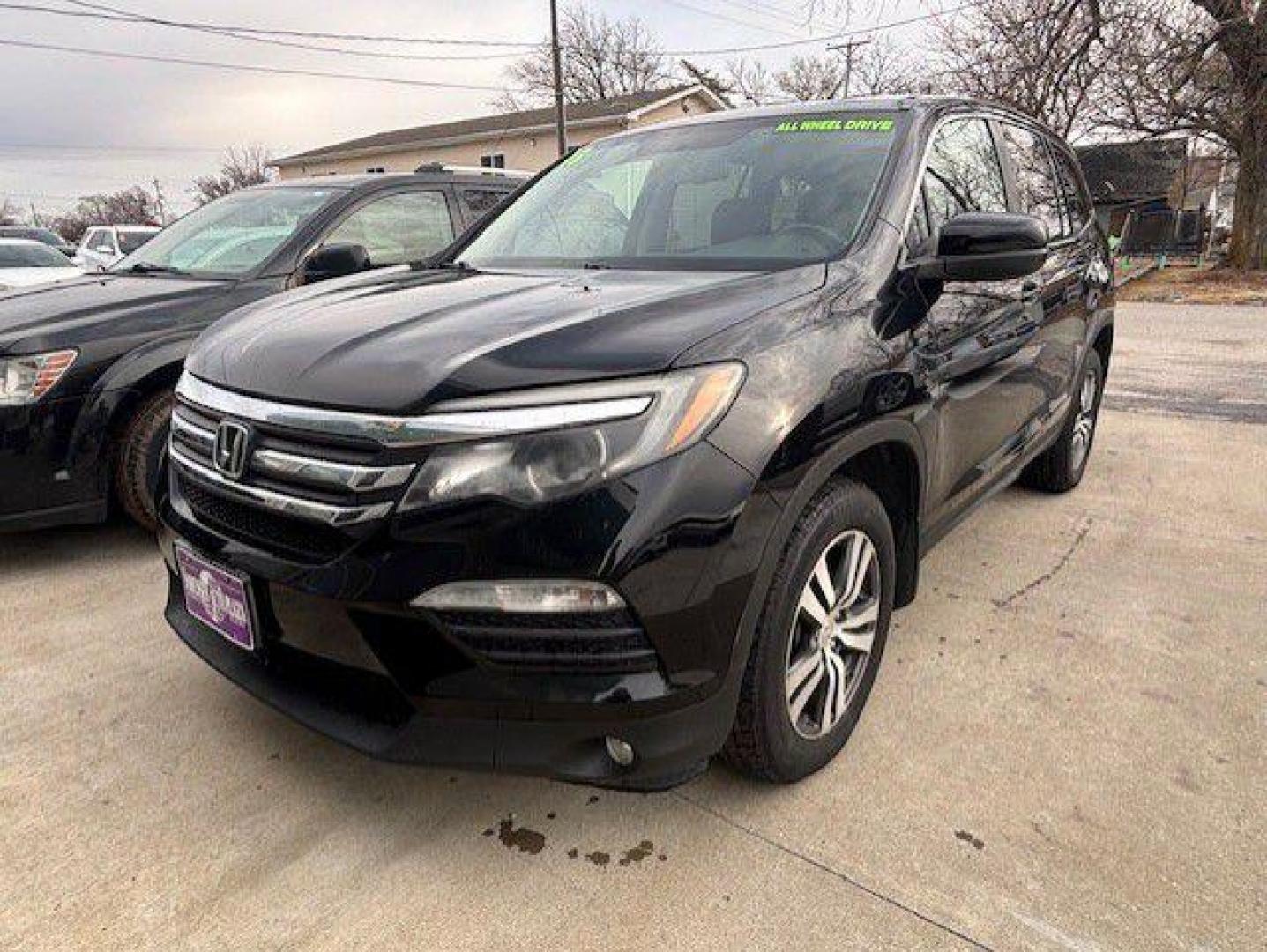 2016 BLACK HONDA PILOT EXL (5FNYF6H52GB) with an 3.5L engine, Automatic transmission, located at 1100 W. Sheridan Ave., Shenandoah, 51601, (712) 246-1600, 40.765678, -95.388817 - Photo#0