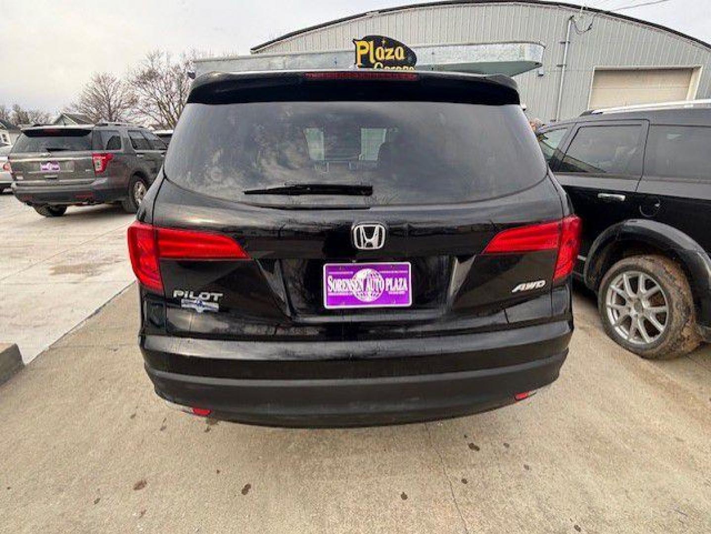 2016 BLACK HONDA PILOT EXL (5FNYF6H52GB) with an 3.5L engine, Automatic transmission, located at 1100 W. Sheridan Ave., Shenandoah, 51601, (712) 246-1600, 40.765678, -95.388817 - Photo#6