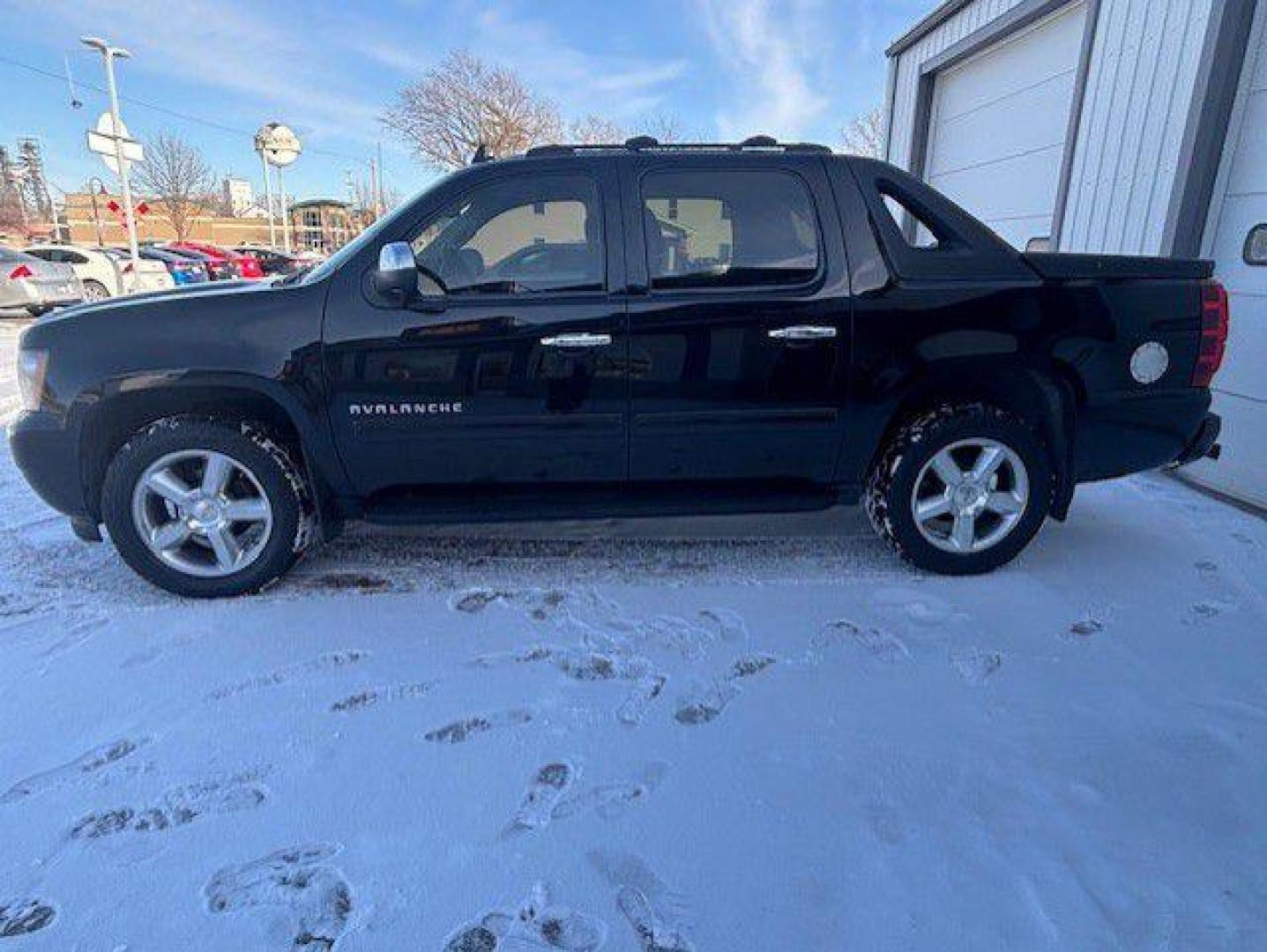 2011 BLACK CHEVROLET AVALANCHE LS (3GNTKEE37BG) with an 5.3L engine, Automatic transmission, located at 1100 W. Sheridan Ave., Shenandoah, 51601, (712) 246-1600, 40.765678, -95.388817 - Photo#1