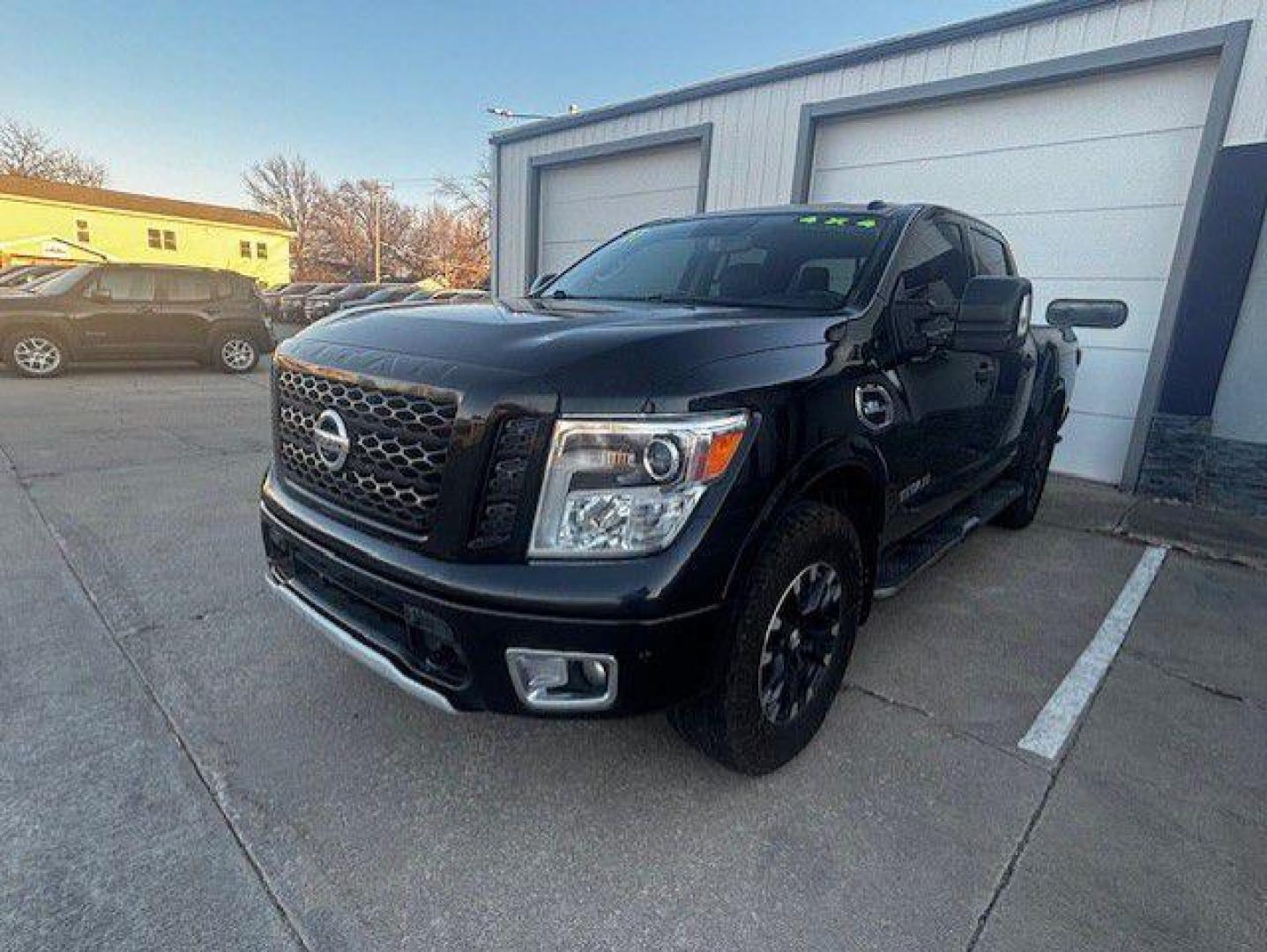 2017 BLACK NISSAN TITAN SV (1N6AA1E55HN) with an 5.6L engine, Automatic transmission, located at 1100 W. Sheridan Ave., Shenandoah, 51601, (712) 246-1600, 40.765678, -95.388817 - Photo#0