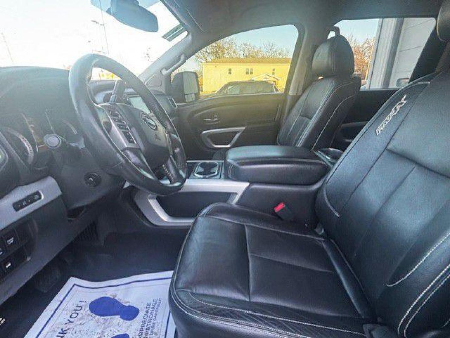 2017 BLACK NISSAN TITAN SV (1N6AA1E55HN) with an 5.6L engine, Automatic transmission, located at 1100 W. Sheridan Ave., Shenandoah, 51601, (712) 246-1600, 40.765678, -95.388817 - Photo#1