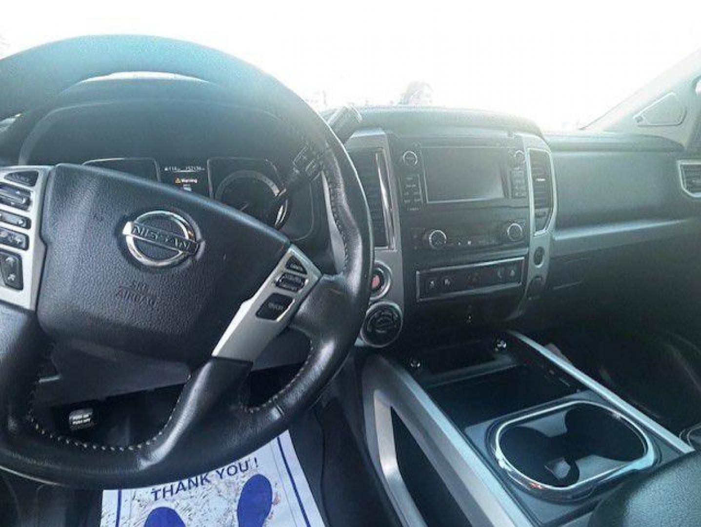 2017 BLACK NISSAN TITAN SV (1N6AA1E55HN) with an 5.6L engine, Automatic transmission, located at 1100 W. Sheridan Ave., Shenandoah, 51601, (712) 246-1600, 40.765678, -95.388817 - Photo#2