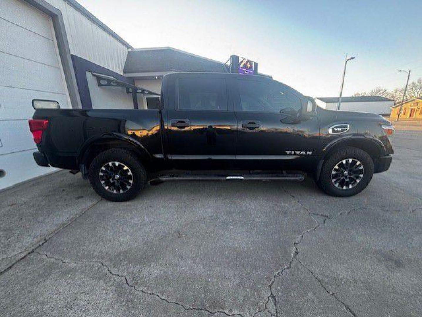 2017 BLACK NISSAN TITAN SV (1N6AA1E55HN) with an 5.6L engine, Automatic transmission, located at 1100 W. Sheridan Ave., Shenandoah, 51601, (712) 246-1600, 40.765678, -95.388817 - Photo#7