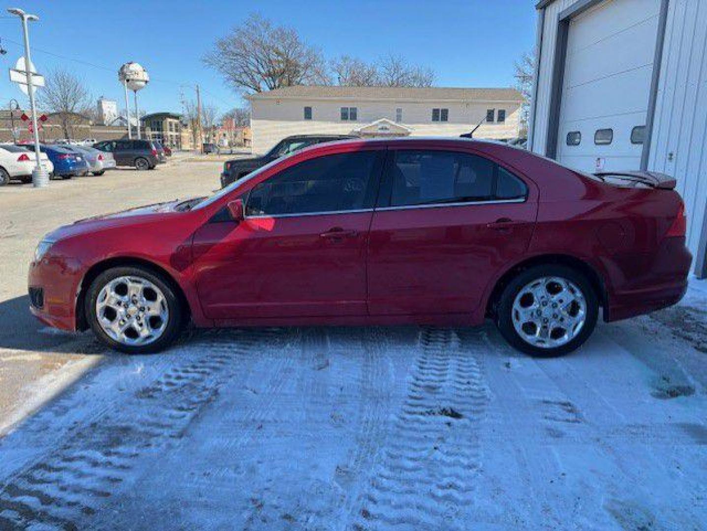 2010 RED FORD FUSION SE (3FAHP0HGXAR) with an 3.0L engine, Automatic transmission, located at 1100 W. Sheridan Ave., Shenandoah, 51601, (712) 246-1600, 40.765678, -95.388817 - Photo#1