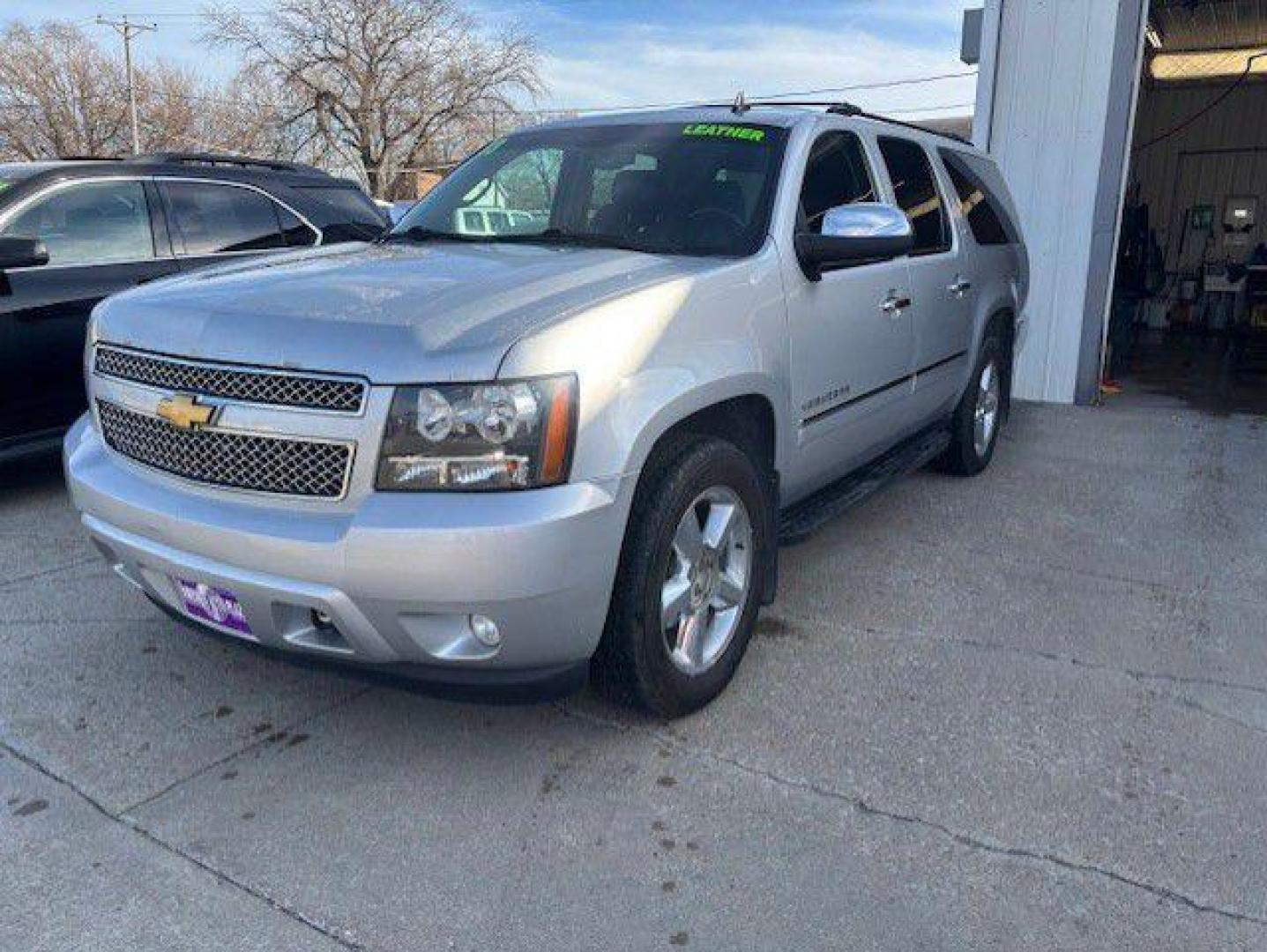 2013 SILVER CHEVROLET SUBURBAN 1500 LTZ (1GNSKKE79DR) with an 5.3L engine, Automatic transmission, located at 1100 W. Sheridan Ave., Shenandoah, 51601, (712) 246-1600, 40.765678, -95.388817 - Photo#0