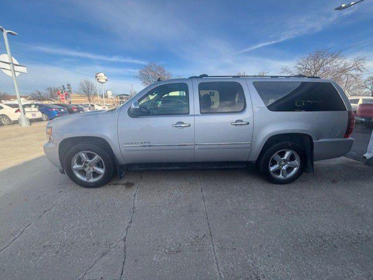 2013 SILVER CHEVROLET SUBURBAN 1500 LTZ (1GNSKKE79DR) with an 5.3L engine, Automatic transmission, located at 1100 W. Sheridan Ave., Shenandoah, 51601, (712) 246-1600, 40.765678, -95.388817 - Photo#1
