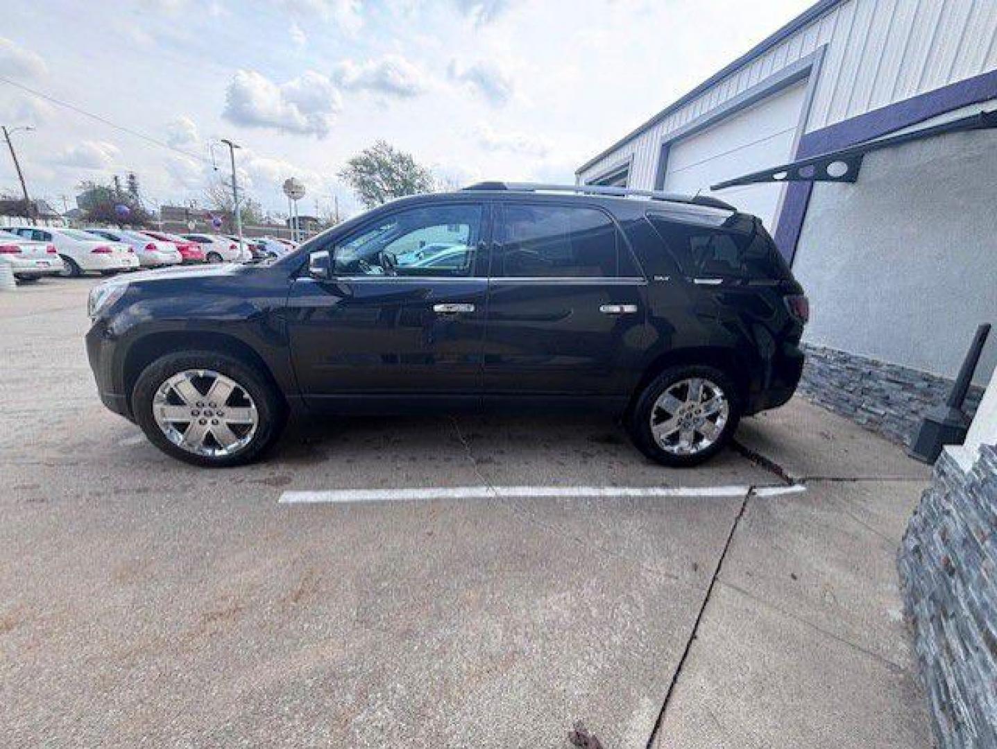 2017 BLACK GMC ACADIA LIMITED SLT-2 (1GKKVSKD9HJ) with an 3.6L engine, Automatic transmission, located at 1100 W. Sheridan Ave., Shenandoah, 51601, (712) 246-1600, 40.765678, -95.388817 - Photo#1