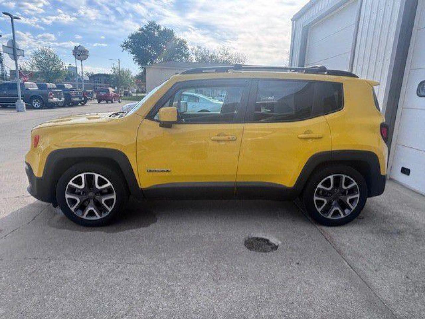 2015 YELLOW JEEP RENEGADE LATITUDE (ZACCJABTXFP) with an 2.4L engine, Automatic transmission, located at 1100 W. Sheridan Ave., Shenandoah, 51601, (712) 246-1600, 40.765678, -95.388817 - Photo#1