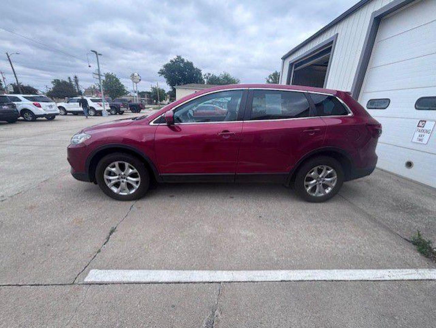 2015 RED MAZDA CX-9 TOURING (JM3TB3CA5F0) with an 3.7L engine, Automatic transmission, located at 1100 W. Sheridan Ave., Shenandoah, 51601, (712) 246-1600, 40.765678, -95.388817- Photo#1