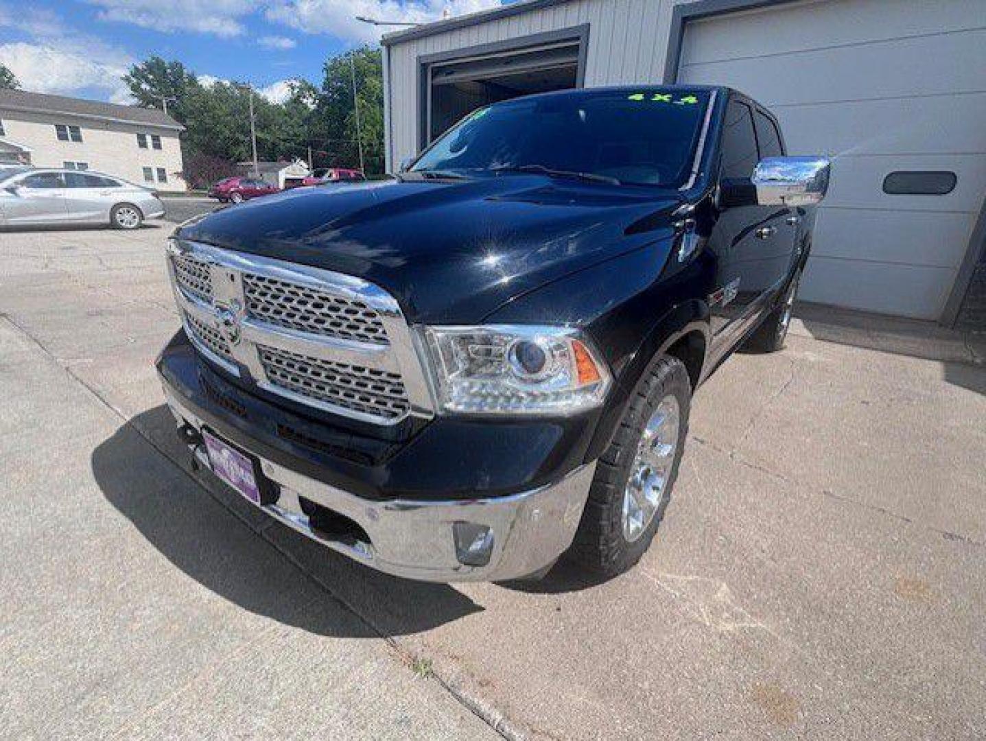 2015 BLACK RAM 1500 LARAMIE (1C6RR7NMXFS) with an 3.0L engine, Automatic transmission, located at 1100 W. Sheridan Ave., Shenandoah, 51601, (712) 246-1600, 40.765678, -95.388817- Photo#0