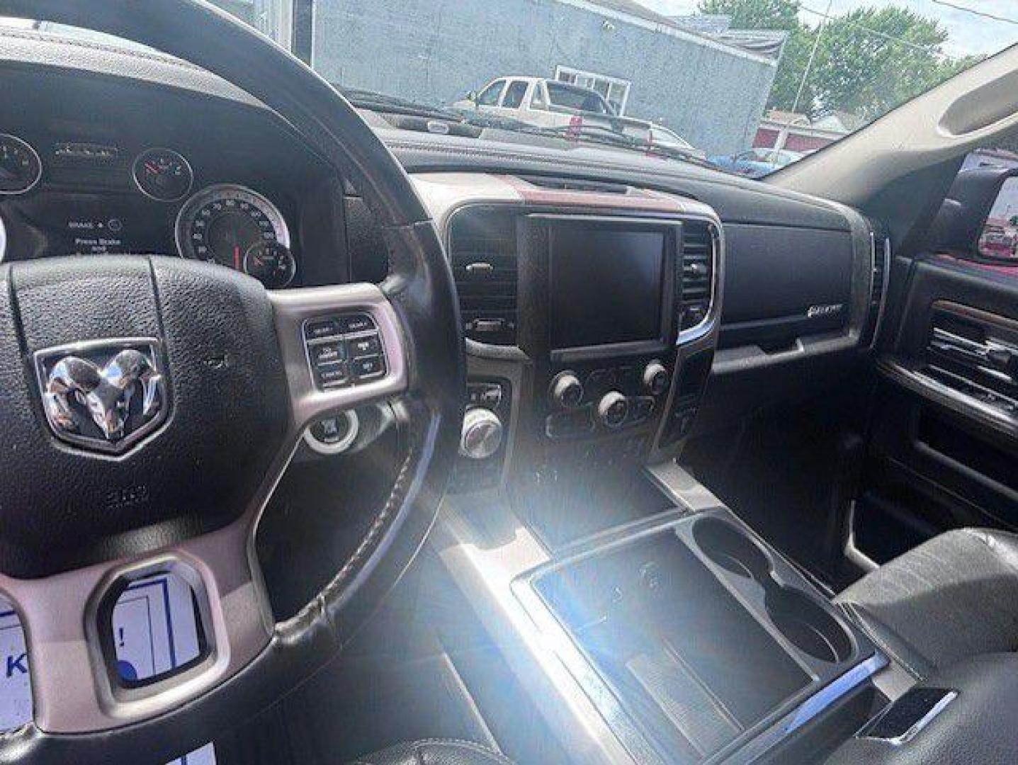 2015 BLACK RAM 1500 LARAMIE (1C6RR7NMXFS) with an 3.0L engine, Automatic transmission, located at 1100 W. Sheridan Ave., Shenandoah, 51601, (712) 246-1600, 40.765678, -95.388817- Photo#4