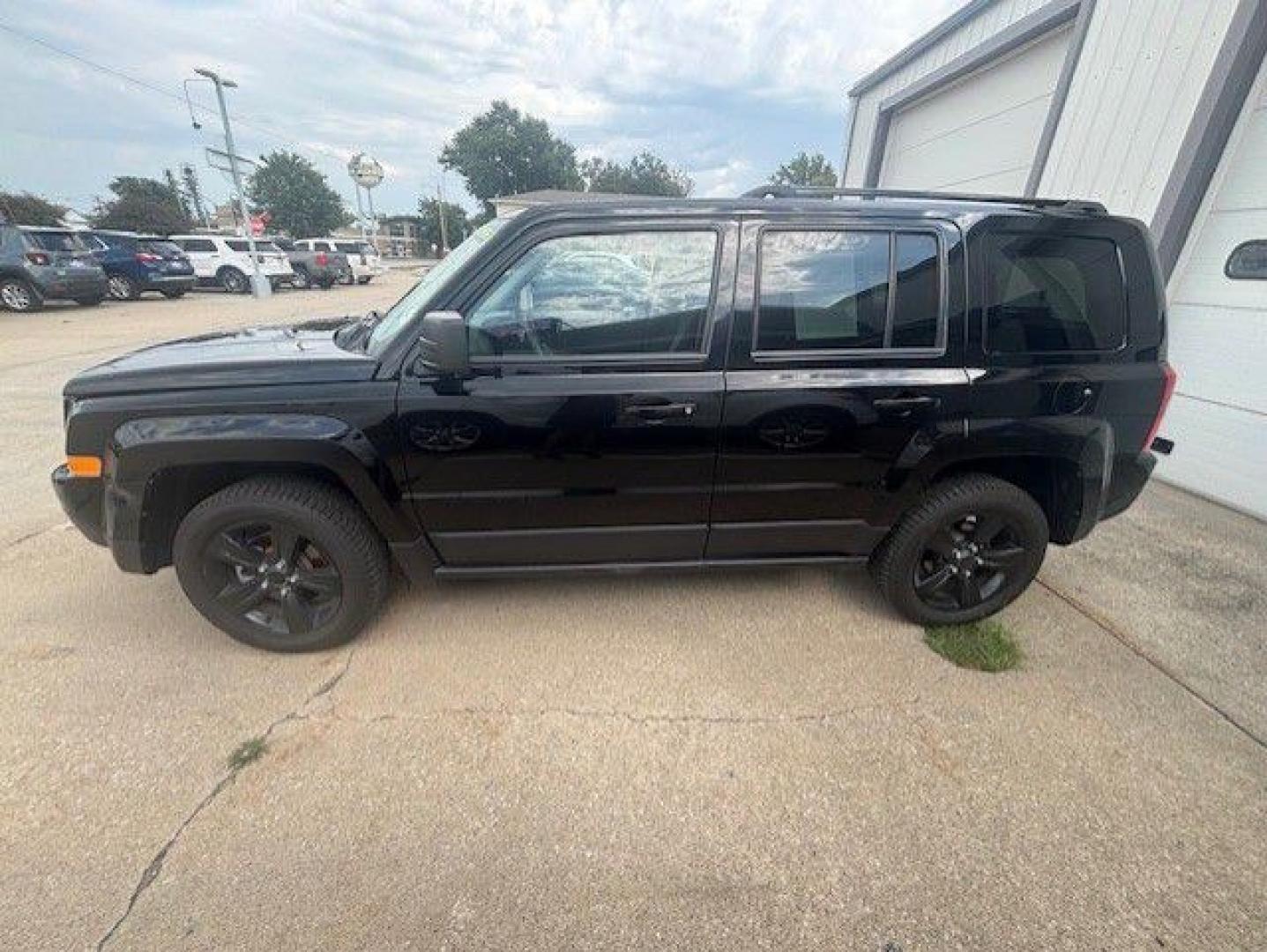 2015 BLACK JEEP PATRIOT SPORT (1C4NJRBB4FD) with an 2.4L engine, Continuously Variable transmission, located at 1100 W. Sheridan Ave., Shenandoah, 51601, (712) 246-1600, 40.765678, -95.388817- Photo#1