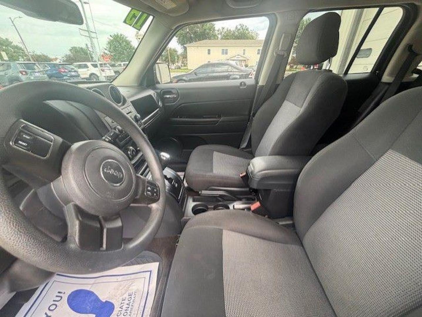 2015 BLACK JEEP PATRIOT SPORT (1C4NJRBB4FD) with an 2.4L engine, Continuously Variable transmission, located at 1100 W. Sheridan Ave., Shenandoah, 51601, (712) 246-1600, 40.765678, -95.388817- Photo#2