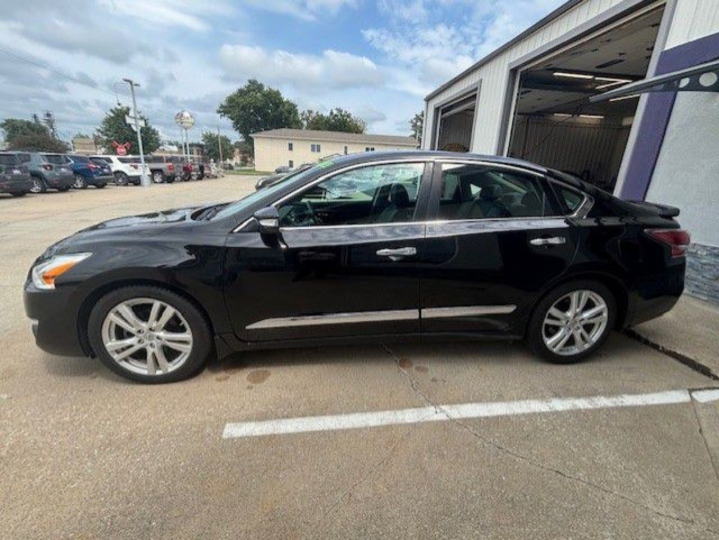 2015 BLACK NISSAN ALTIMA 3.5S (1N4BL3AP3FC) with an 3.5L engine, Continuously Variable transmission, located at 1100 W. Sheridan Ave., Shenandoah, 51601, (712) 246-1600, 40.765678, -95.388817- Photo#1