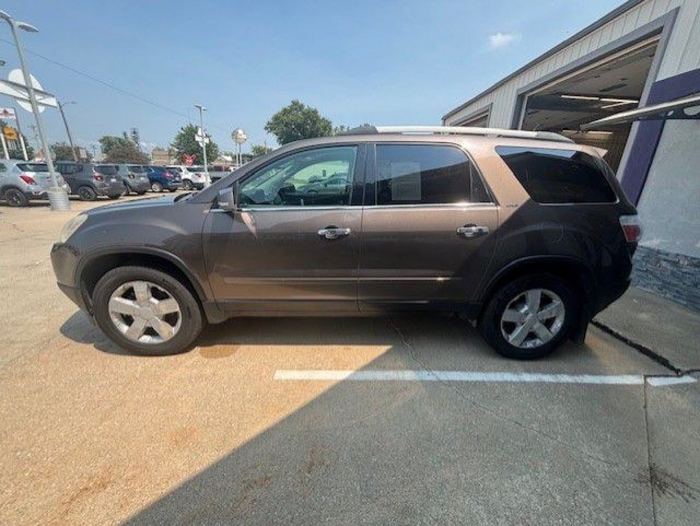2012 BROWN GMC ACADIA SLT-1 (1GKKVRED5CJ) with an 3.6L engine, Automatic transmission, located at 1100 W. Sheridan Ave., Shenandoah, 51601, (712) 246-1600, 40.765678, -95.388817- Photo#1