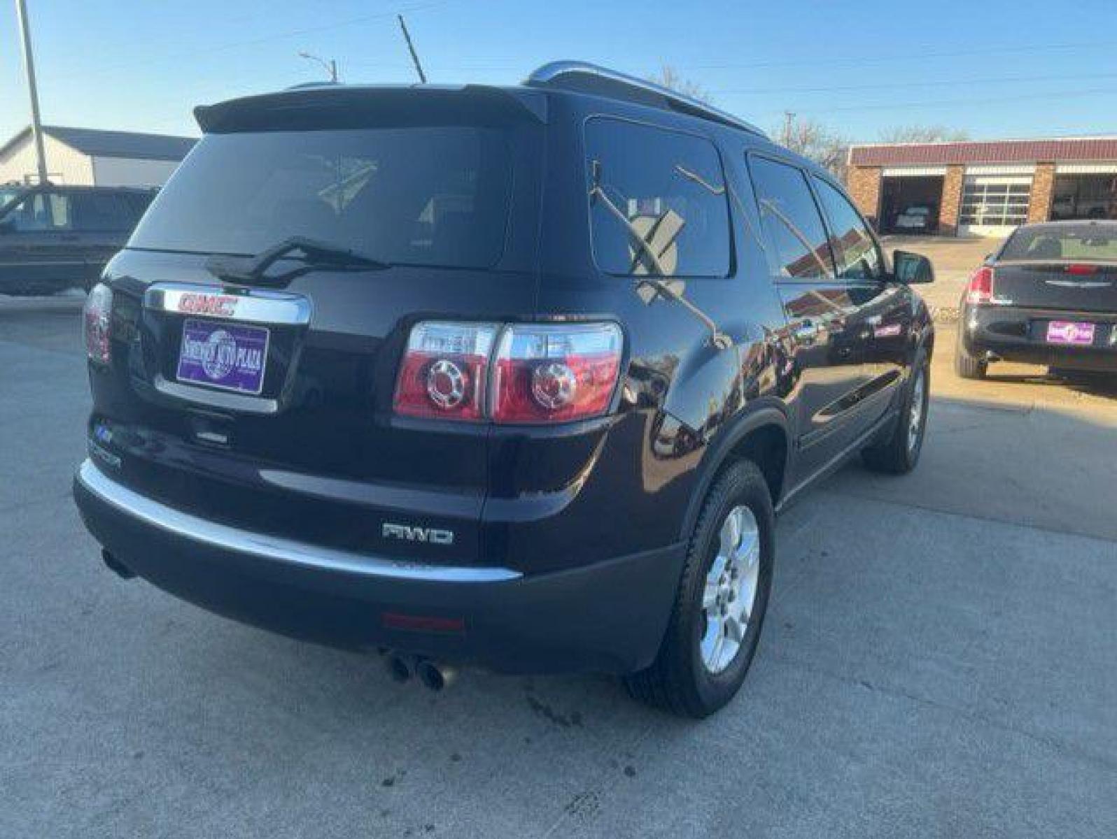 2009 PURPLE GMC ACADIA SLE (1GKEV13D69J) with an 3.6L engine, Automatic transmission, located at 1100 W. Sheridan Ave., Shenandoah, 51601, (712) 246-1600, 40.765678, -95.388817 - Photo #1