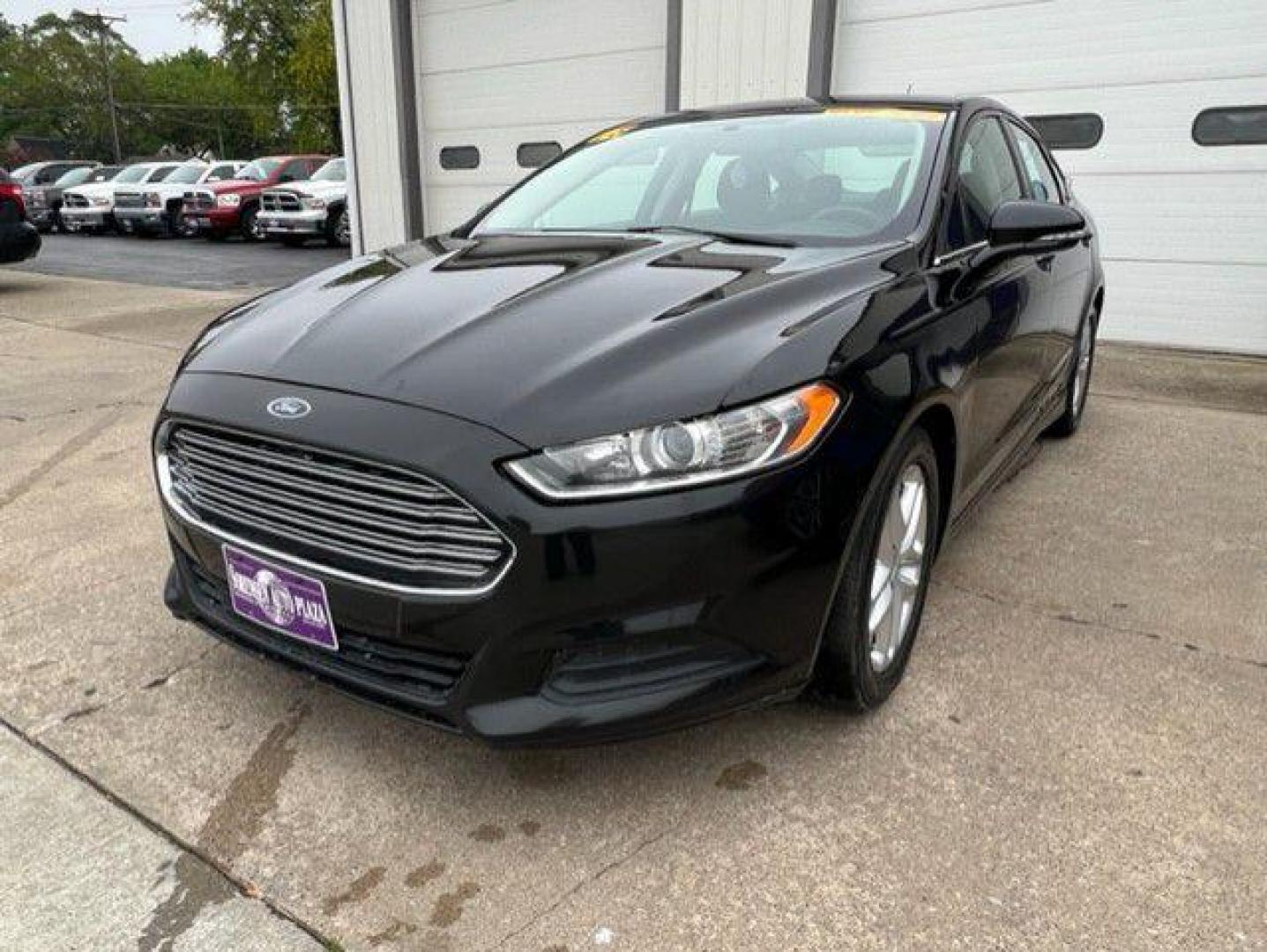2015 BLACK FORD FUSION SE (1FA6P0H74F5) with an 2.5L engine, Automatic transmission, located at 1100 W. Sheridan Ave., Shenandoah, 51601, (712) 246-1600, 40.765678, -95.388817 - Photo#0