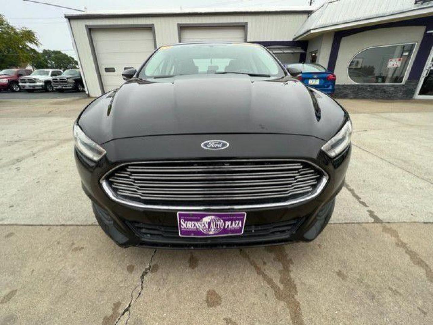 2015 BLACK FORD FUSION SE (1FA6P0H74F5) with an 2.5L engine, Automatic transmission, located at 1100 W. Sheridan Ave., Shenandoah, 51601, (712) 246-1600, 40.765678, -95.388817 - Photo#6