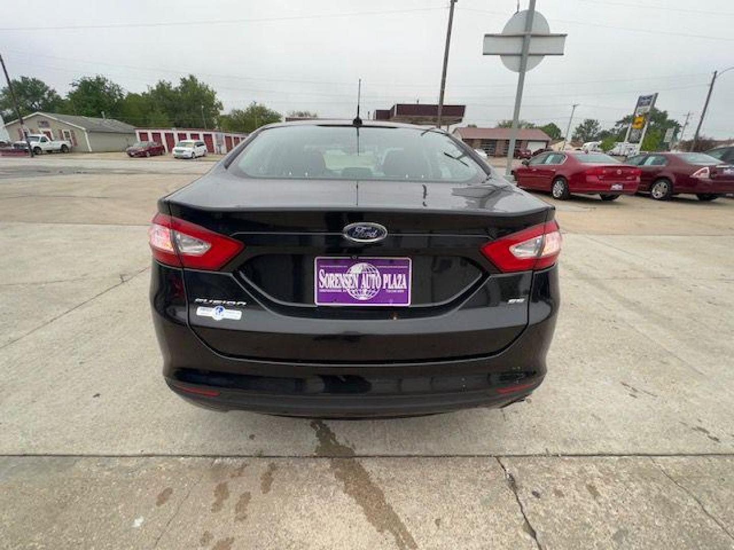 2015 BLACK FORD FUSION SE (1FA6P0H74F5) with an 2.5L engine, Automatic transmission, located at 1100 W. Sheridan Ave., Shenandoah, 51601, (712) 246-1600, 40.765678, -95.388817 - Photo#7