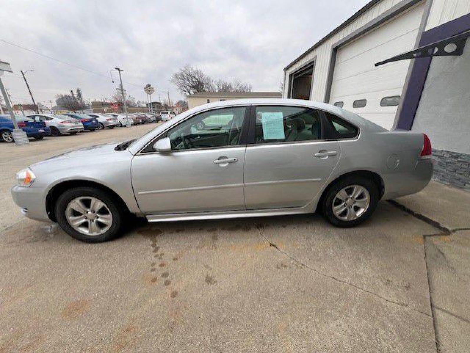 2013 SILVER CHEVROLET IMPALA LS (2G1WF5E38D1) with an 3.6L engine, Automatic transmission, located at 1100 W. Sheridan Ave., Shenandoah, 51601, (712) 246-1600, 40.765678, -95.388817 - Photo #2