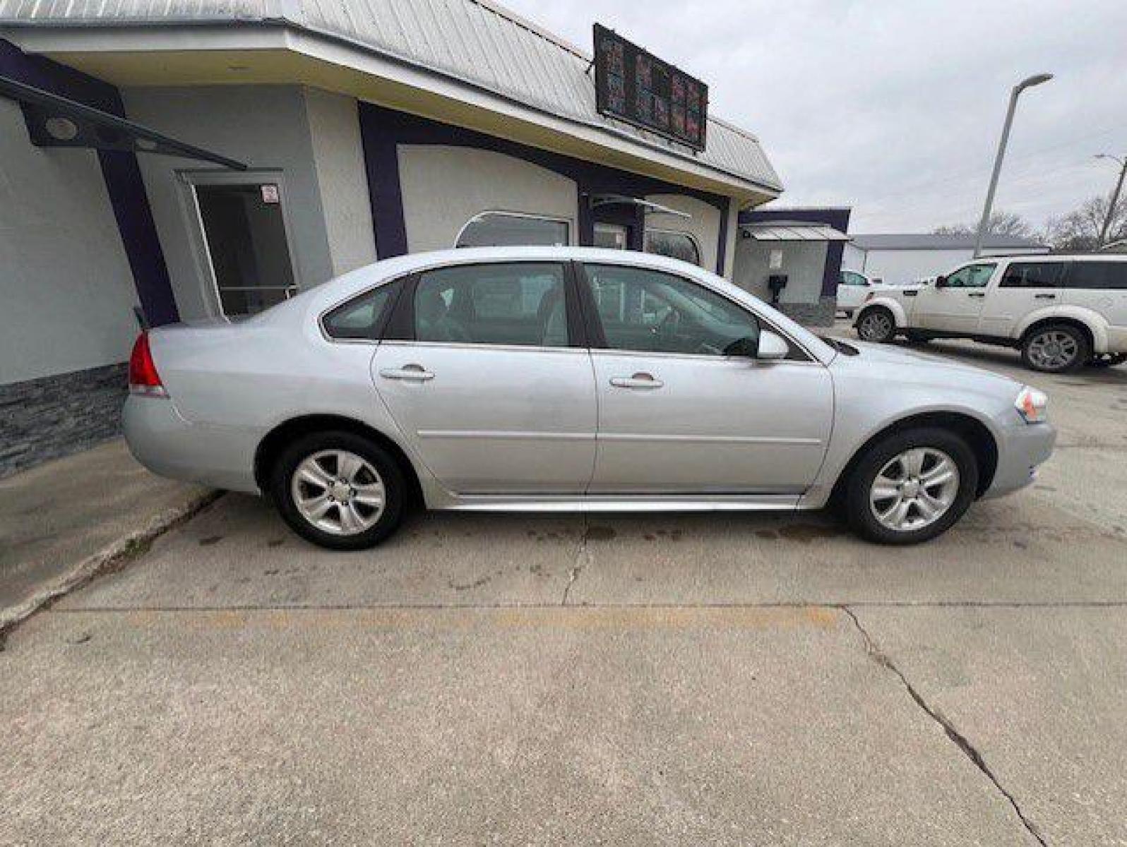 2013 SILVER CHEVROLET IMPALA LS (2G1WF5E38D1) with an 3.6L engine, Automatic transmission, located at 1100 W. Sheridan Ave., Shenandoah, 51601, (712) 246-1600, 40.765678, -95.388817 - Photo #6