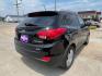 2010 BLACK HYUNDAI TUCSON GLS (KM8JUCAC9AU) with an 2.4L engine, Automatic transmission, located at 1100 W. Sheridan Ave., Shenandoah, 51601, (712) 246-1600, 40.765678, -95.388817 - Photo#1